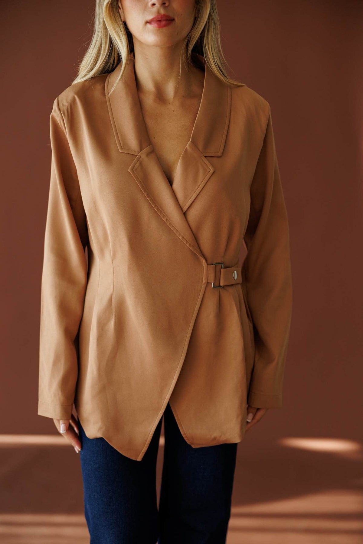 Back In The City Jacket in taupe, front close-up of the belted waist and lapel
