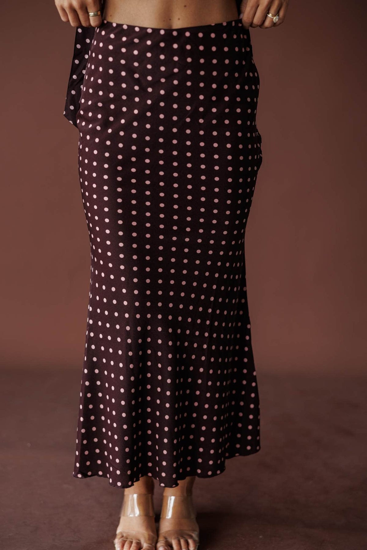 Wine polka dot satin bias midi skirt, front view