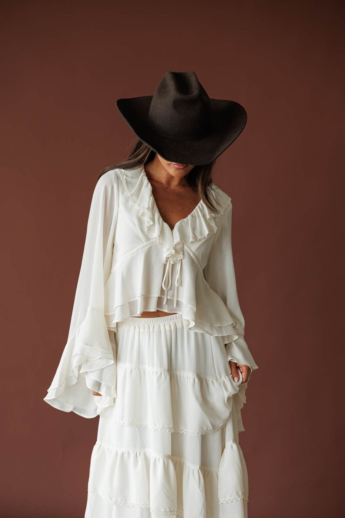 Cream ruffle V neck blouse