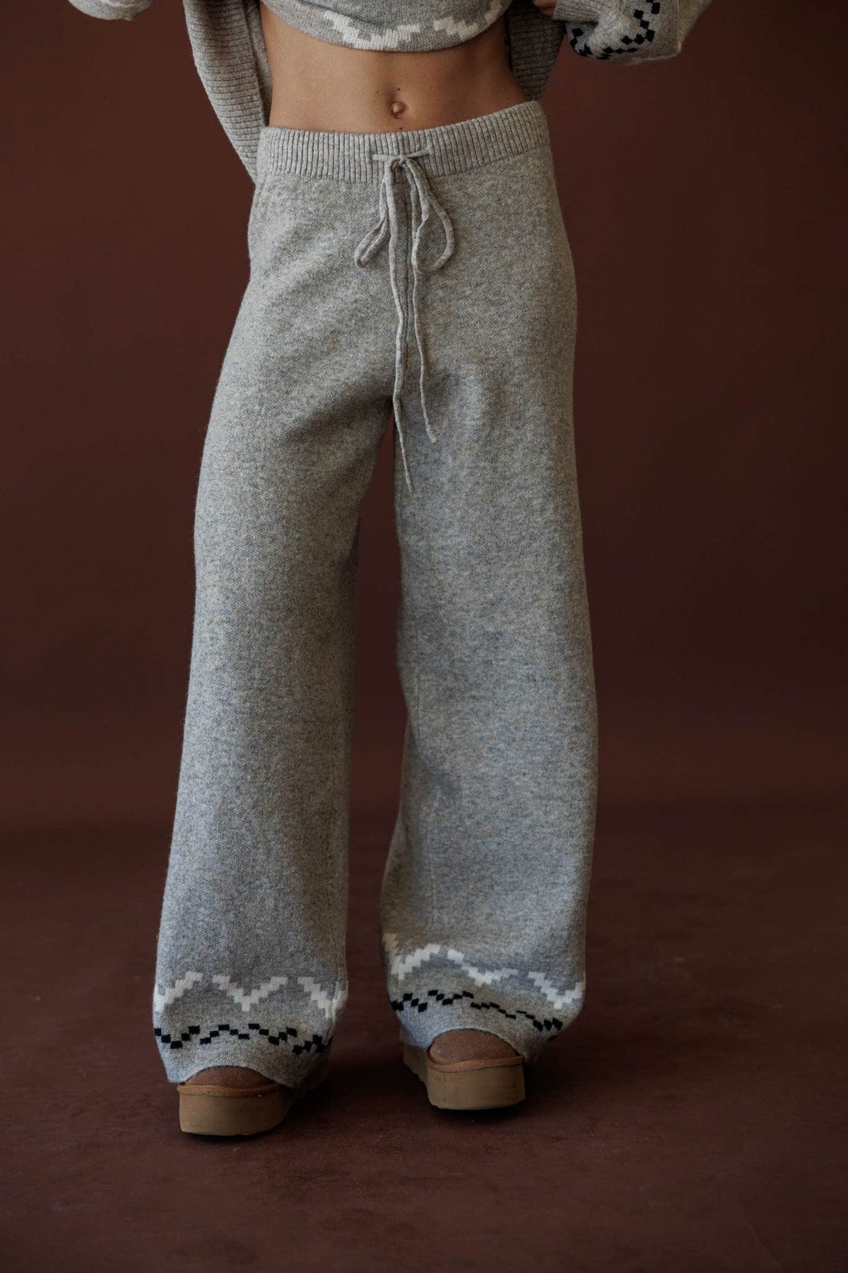 Cabin Cozy Sweater Pants, in stone, front view of the wide leg and patterned hem