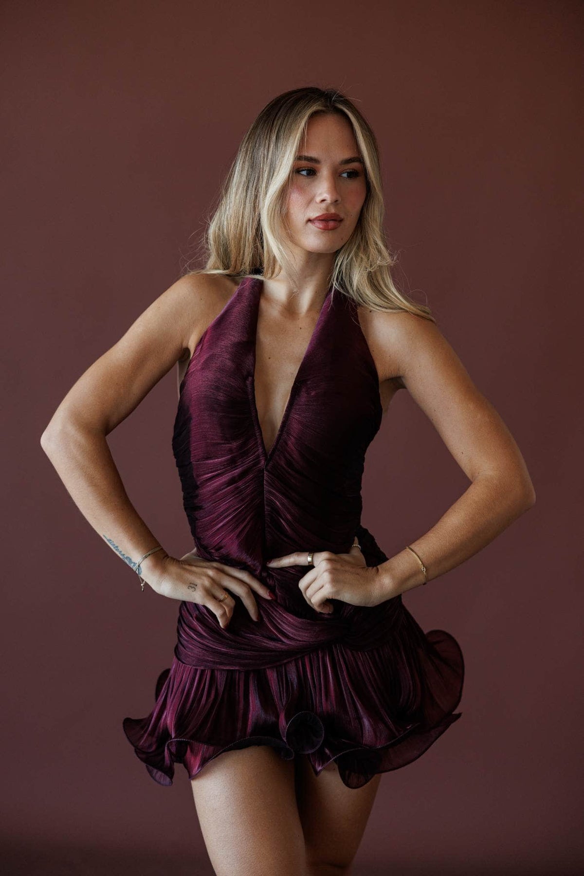 Dancing Till Sunrise Dress, in wine, front view of the ruffle hem