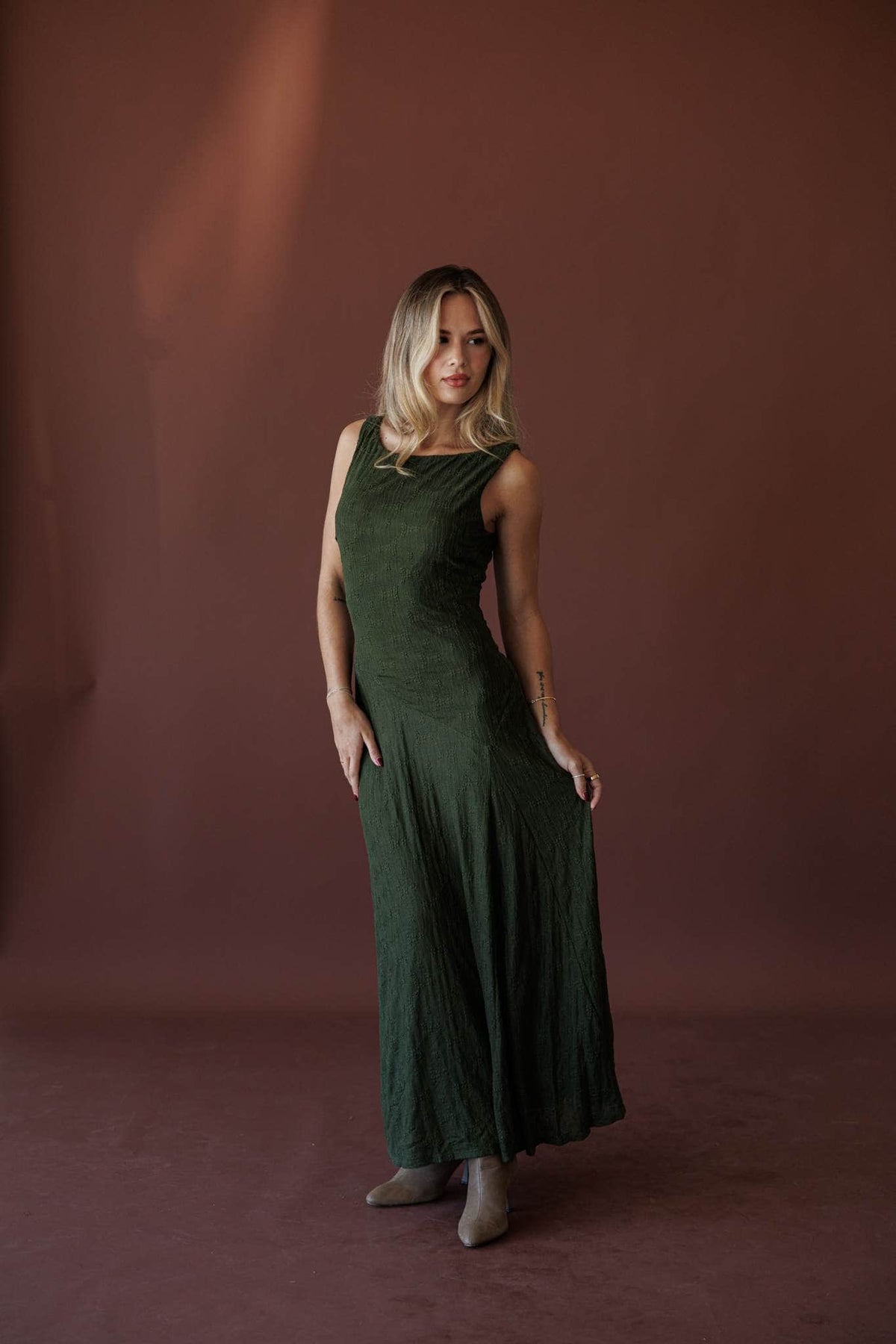Evergreen Evening Maxi Dress, full-length front view of the pleated maxi