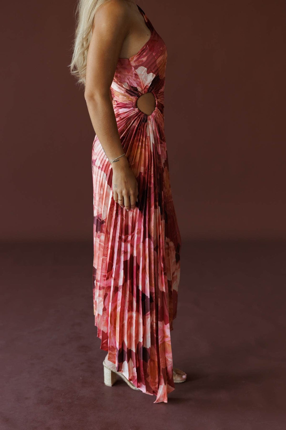 Petal Effect Maxi Dress in romantic floral, side view showing the cut out and pleats