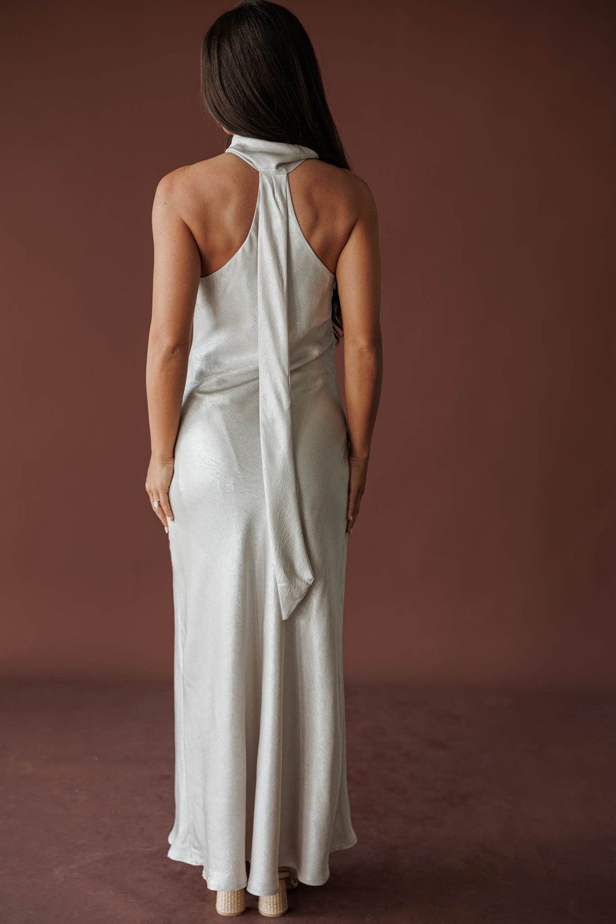 Moonlight Satin Halter Maxi, in silverlight, back view of the open back