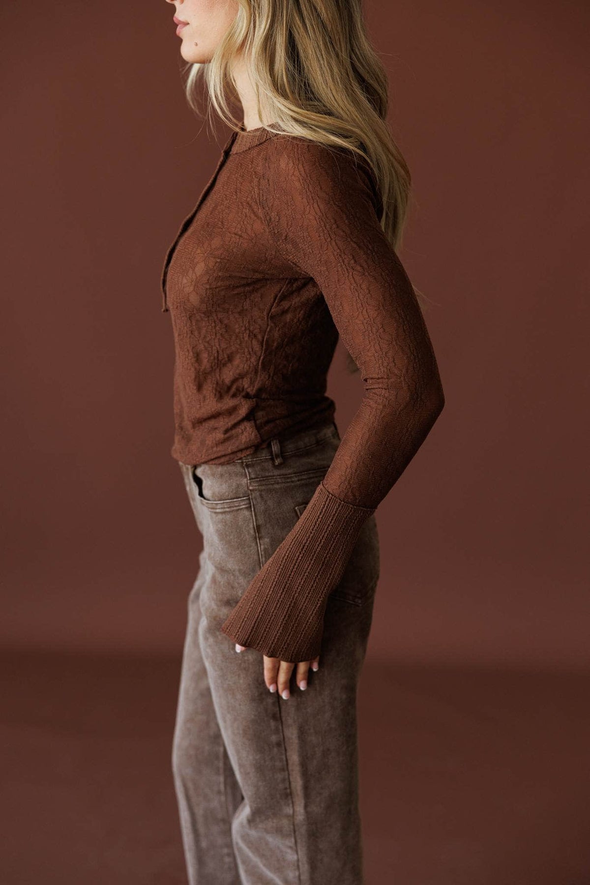 First Layer Henley Top in chocolate, side view showing the long sleeve and sheer knit