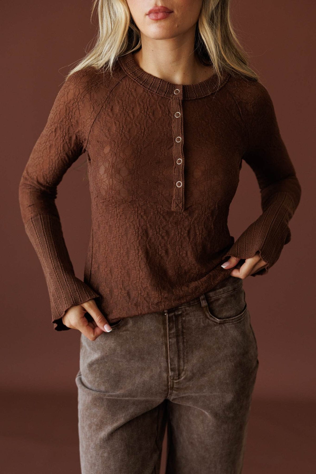 First Layer Henley Top in chocolate, front close-up of the henley placket and sheer knit
