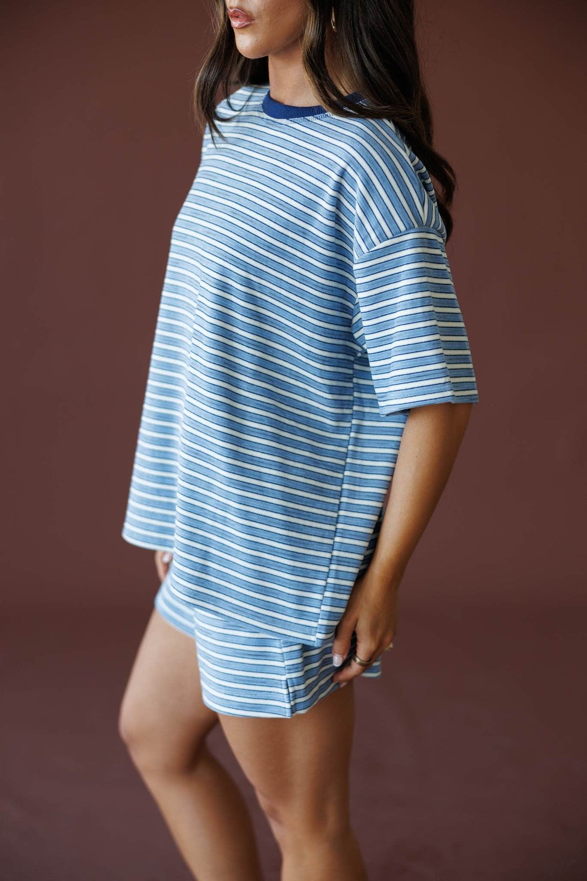 First Stop Oversized Fleece Tee in blue, side view showing the oversized striped fleece