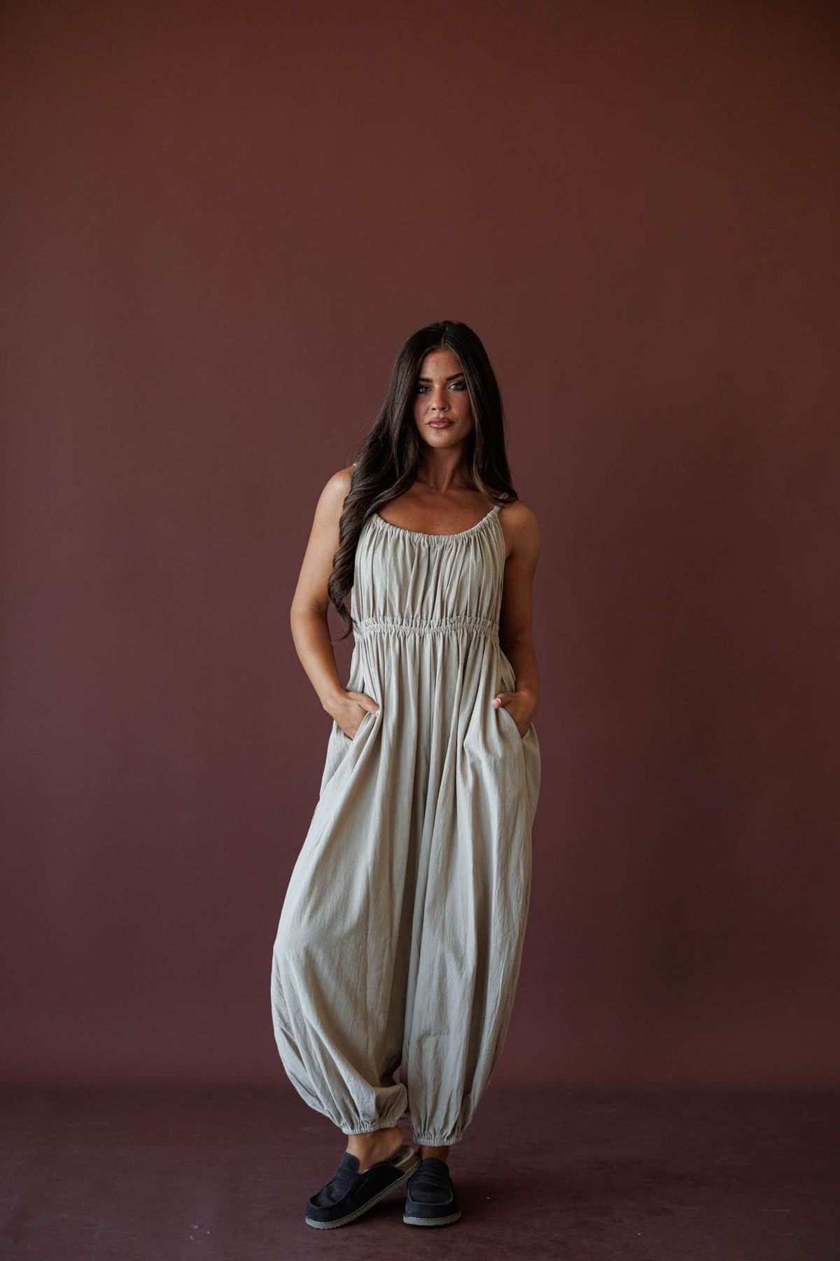 The Roam Jumpsuit, in sand, full-length front view of the balloon jumpsuit
