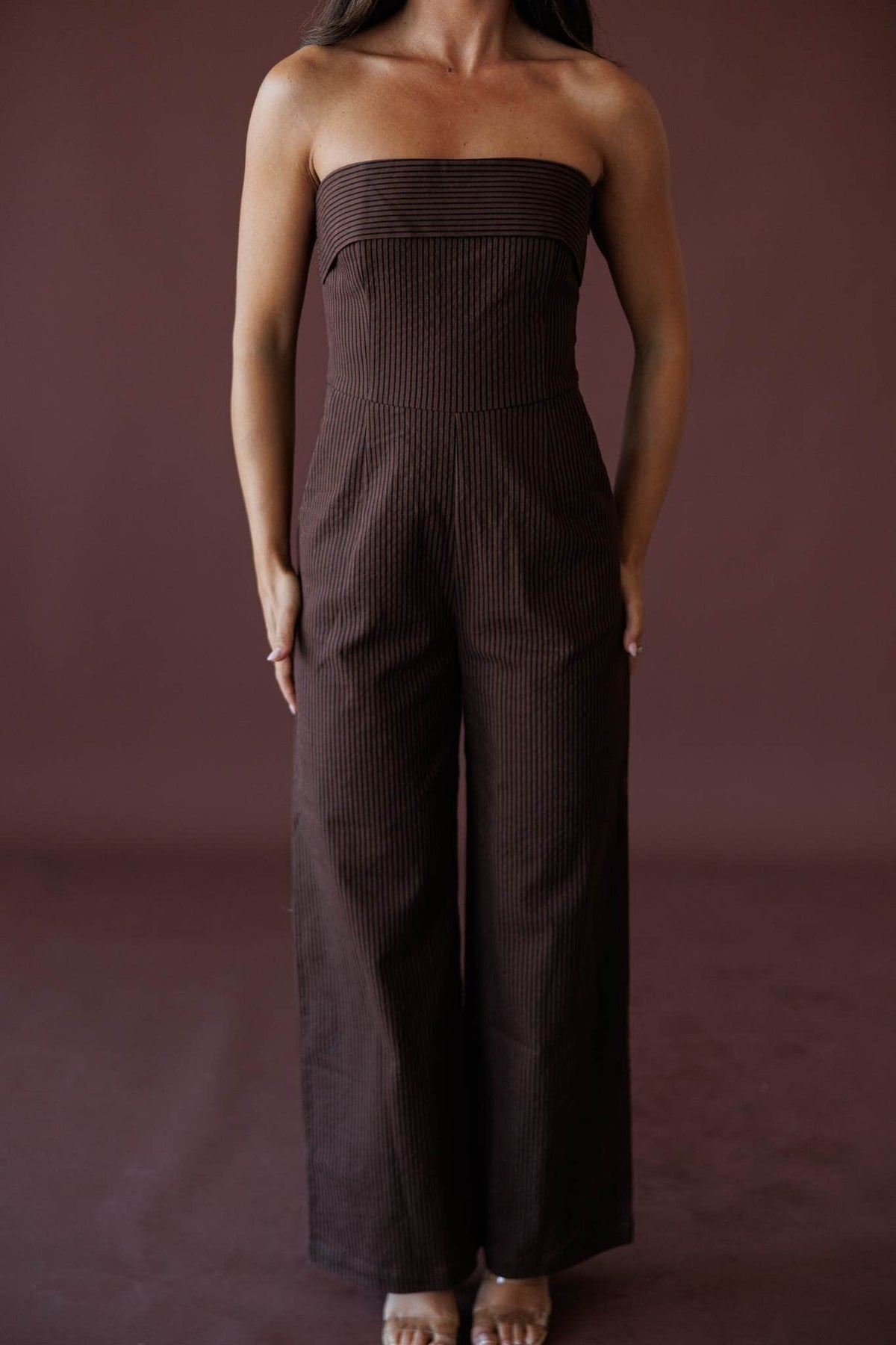 Cocoa Hour Strapless Jumpsuit, in brown, close front view of the fitted bodice