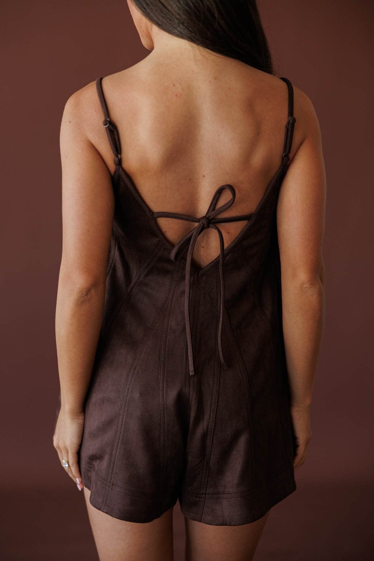 Dark Brown Suede Romper, back view of the open tie back