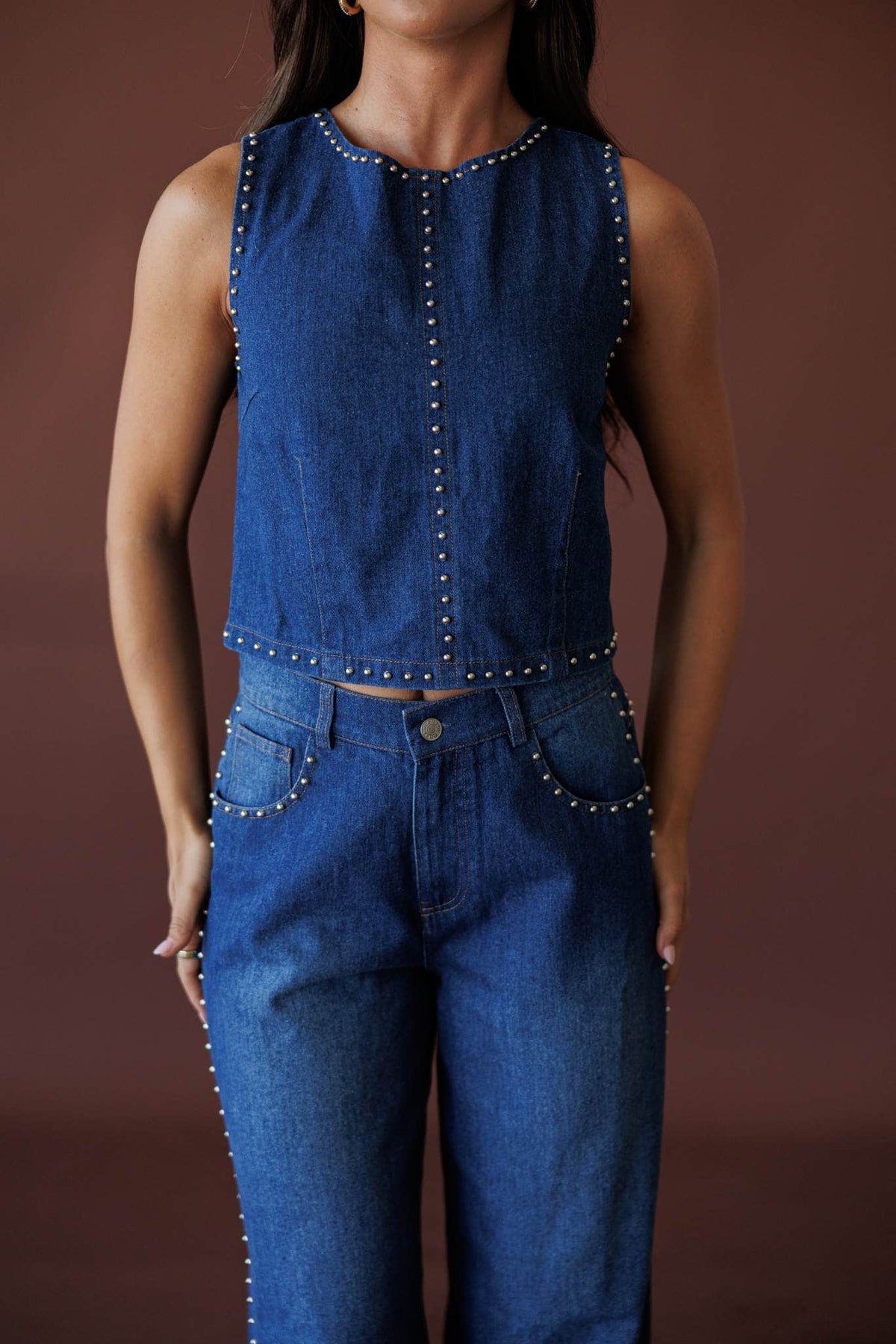 Studded Line Denim Vest, in denim, close side view of the studded hem