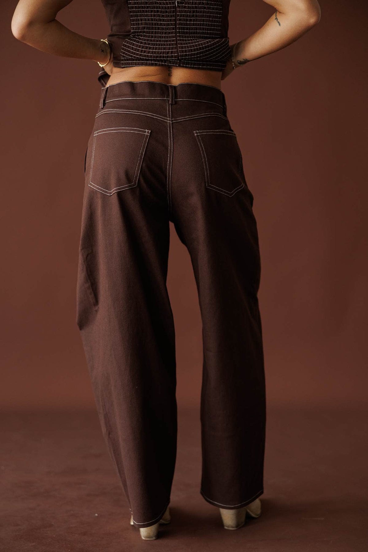 Roadhouse Barrel Pants in brown, back view of the high waist and barrel leg