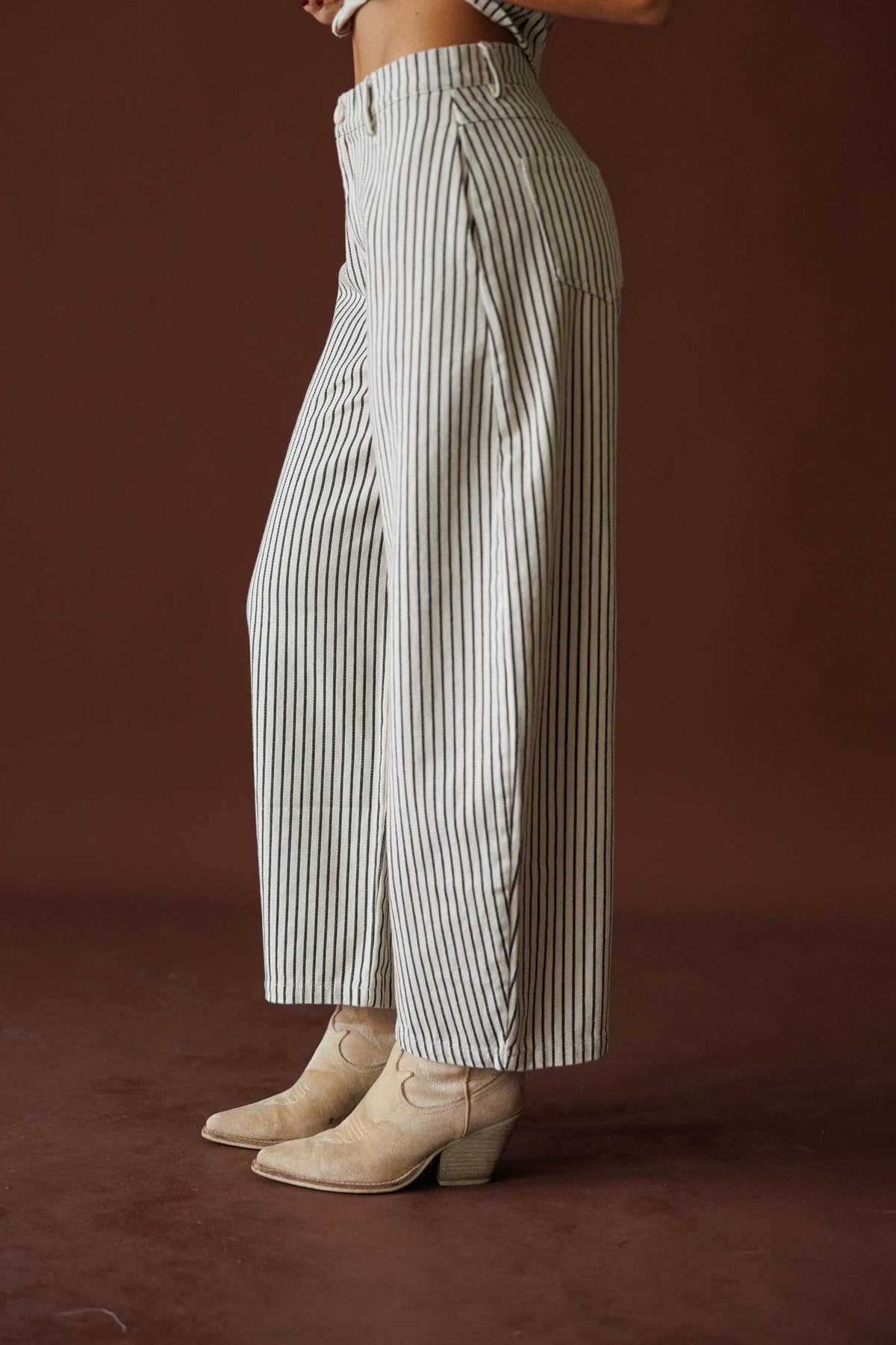 Day In The City Barrel Pants in natural pinstripe, side view of the high waist and roomy leg