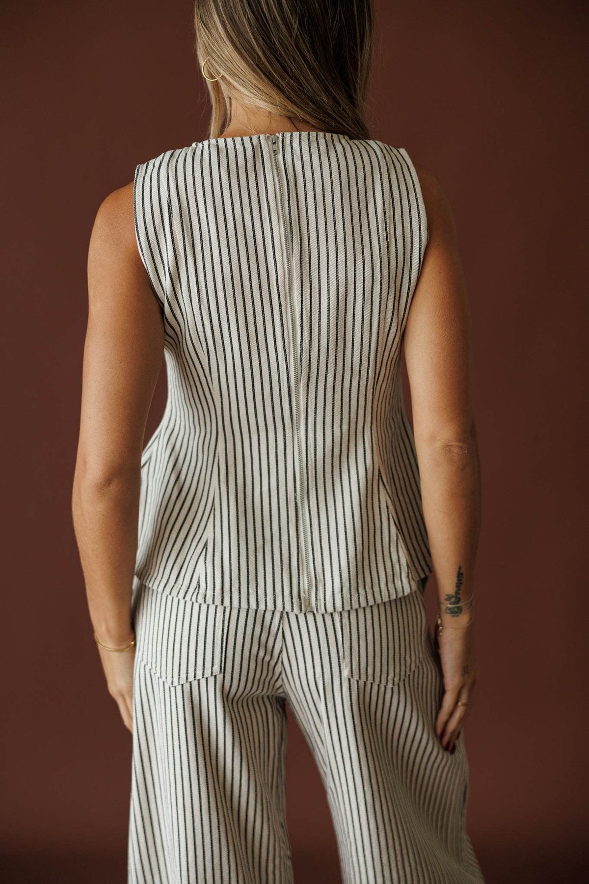 Day In The City Top in natural pinstripe, back view of the sleeveless cut
