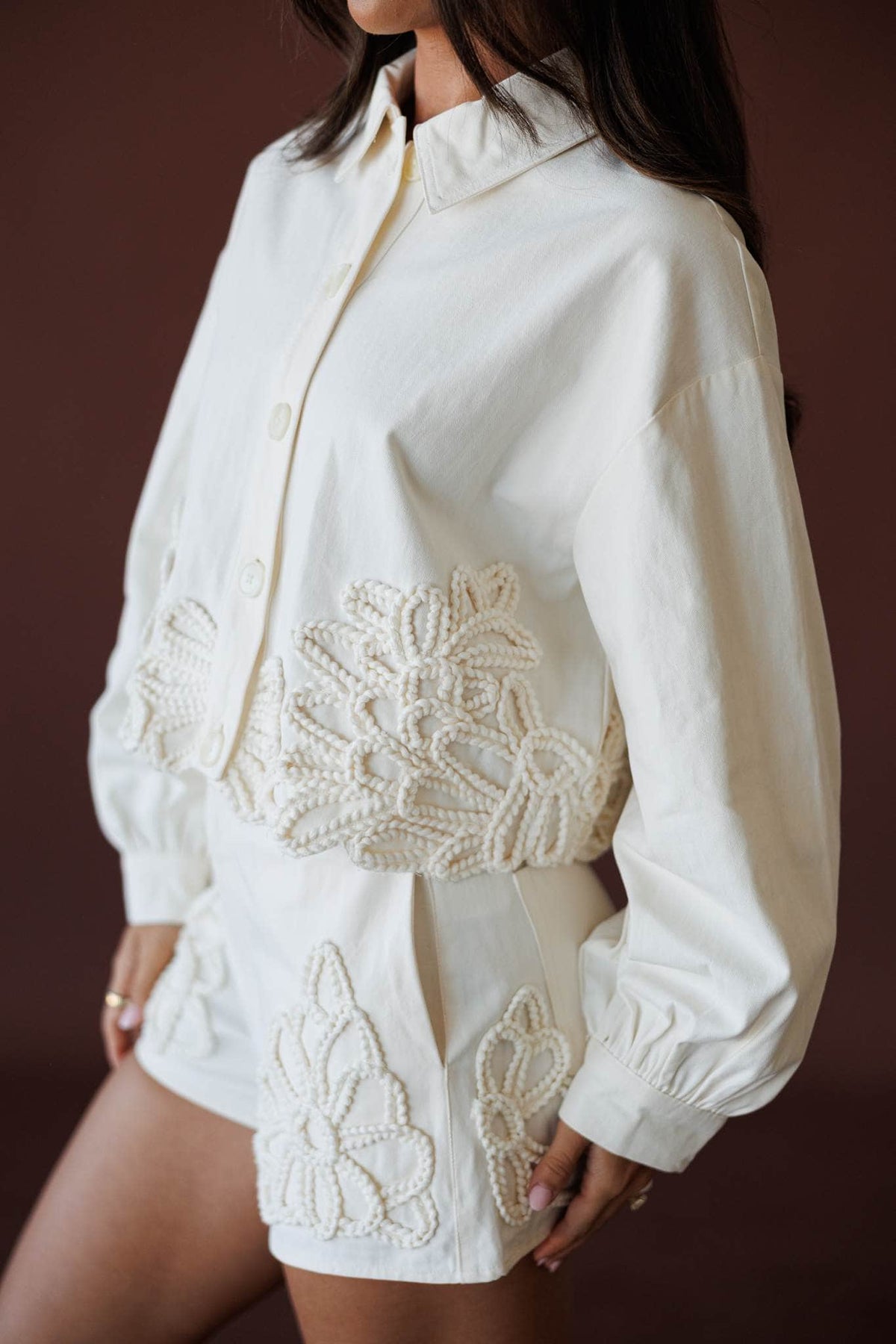 Wildflower Utility Jacket, in ecru, close front view of the crochet appliqué