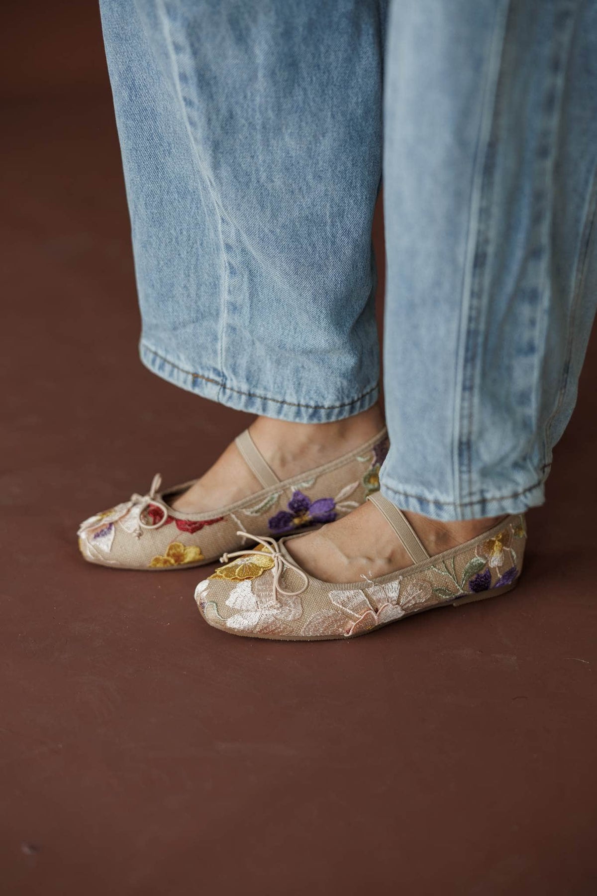 London Floral Ballet Flat, in floral, front view of the ballet flats worn with denim