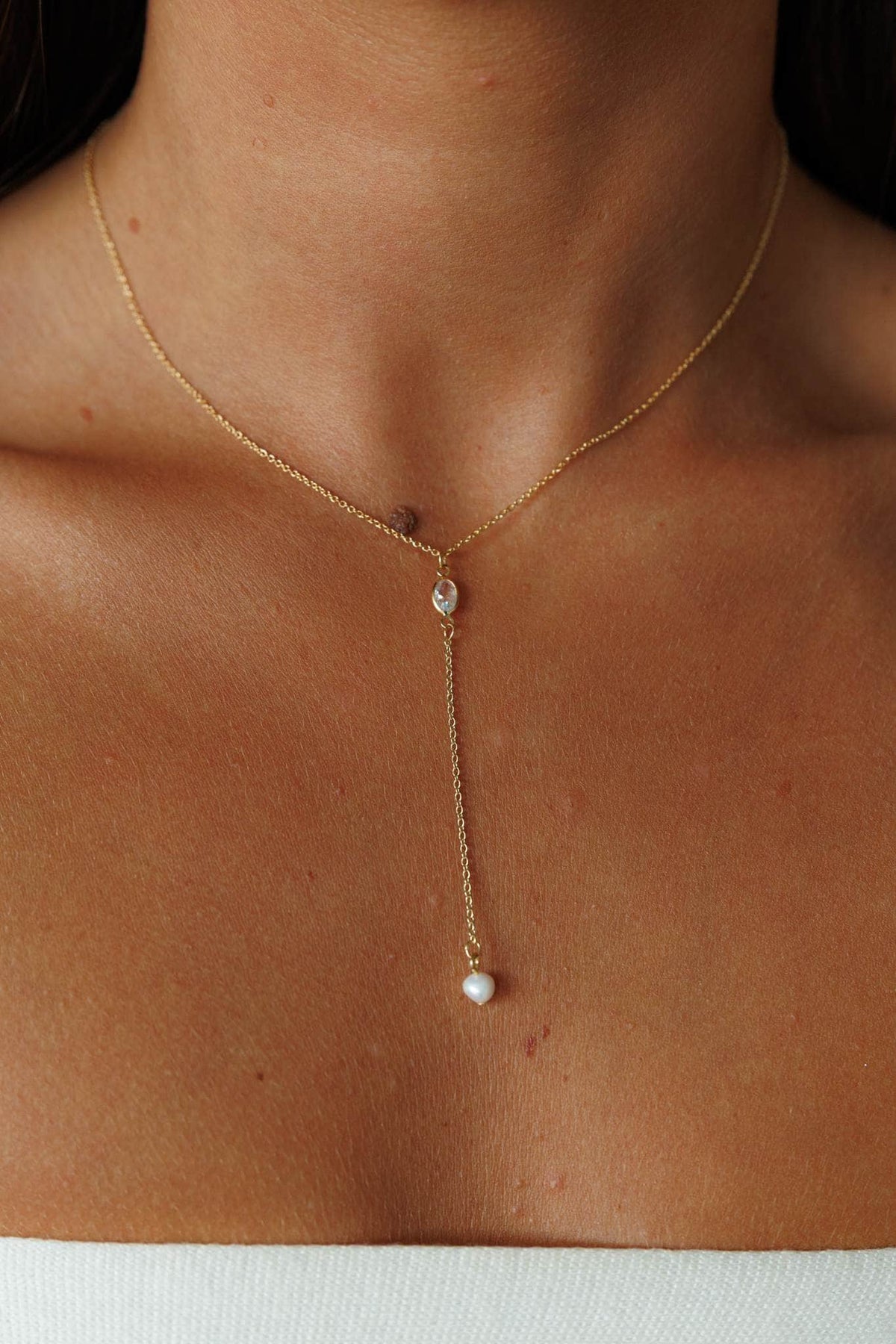 Pearl Drop Lariat Necklace, worn at the neck