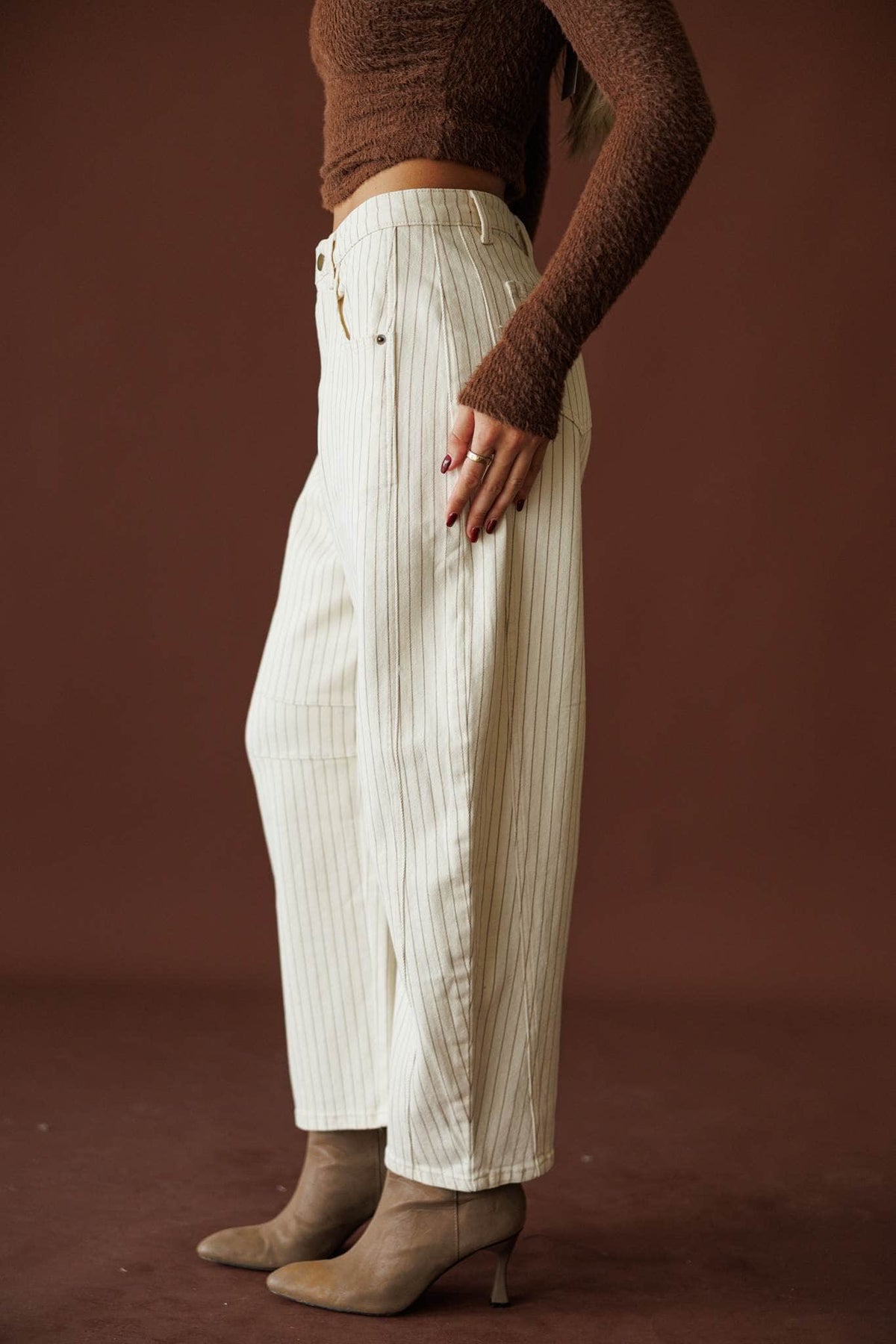 Astor Pinstripe Pants, in cream, side view of the barrel leg