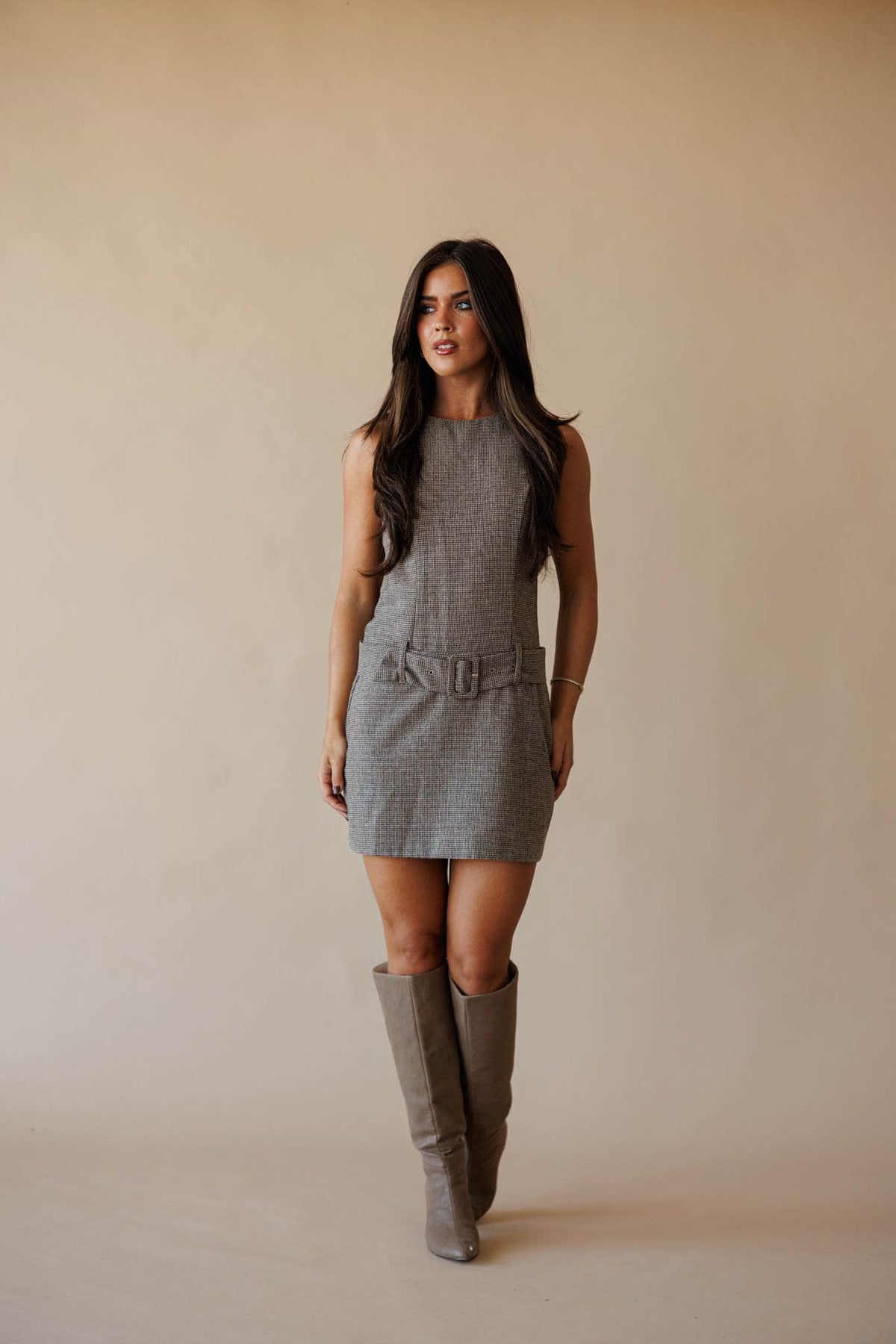 Brown houndstooth sleeveless mini dress, front view