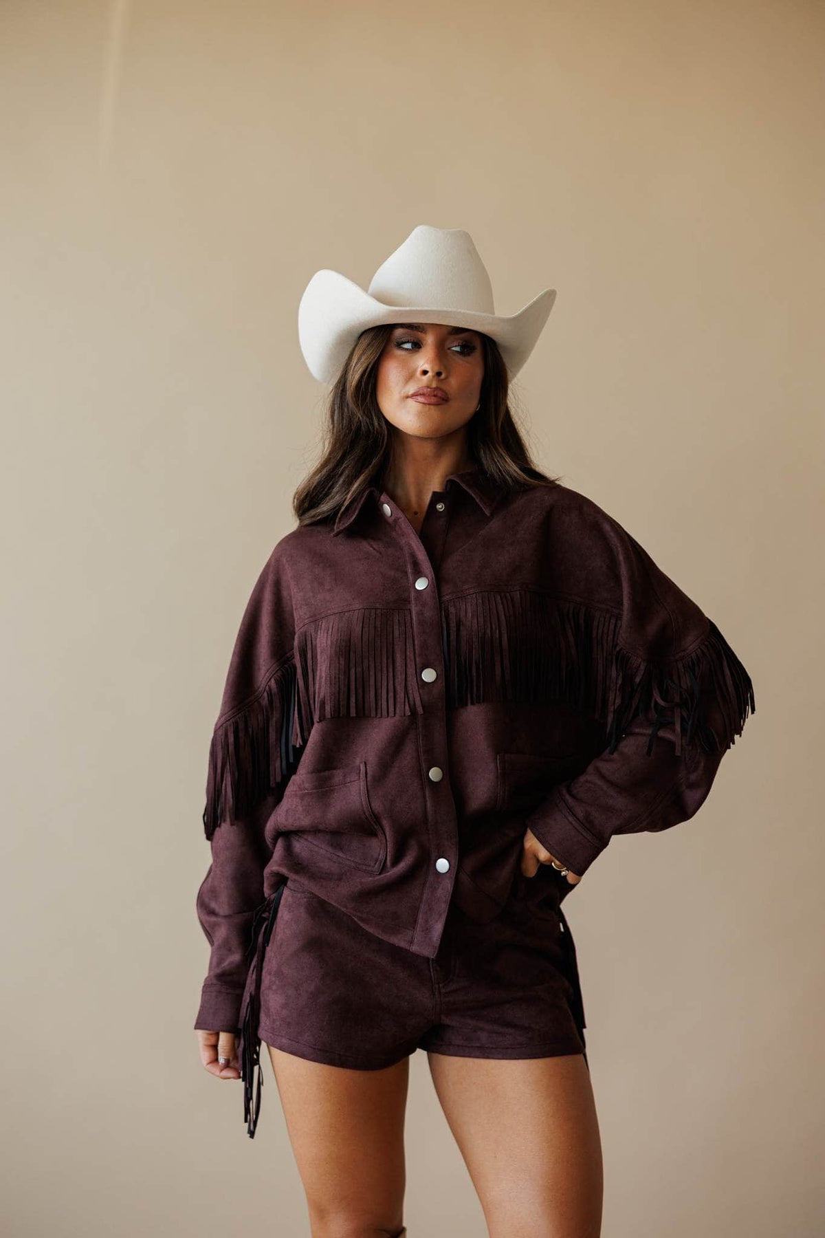 Dark brown suede jacket with fringe