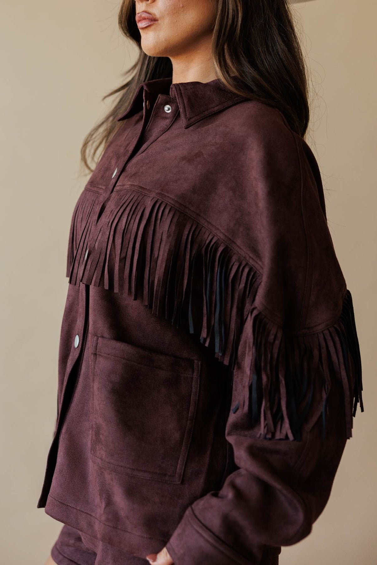 Dark brown suede jacket with fringe