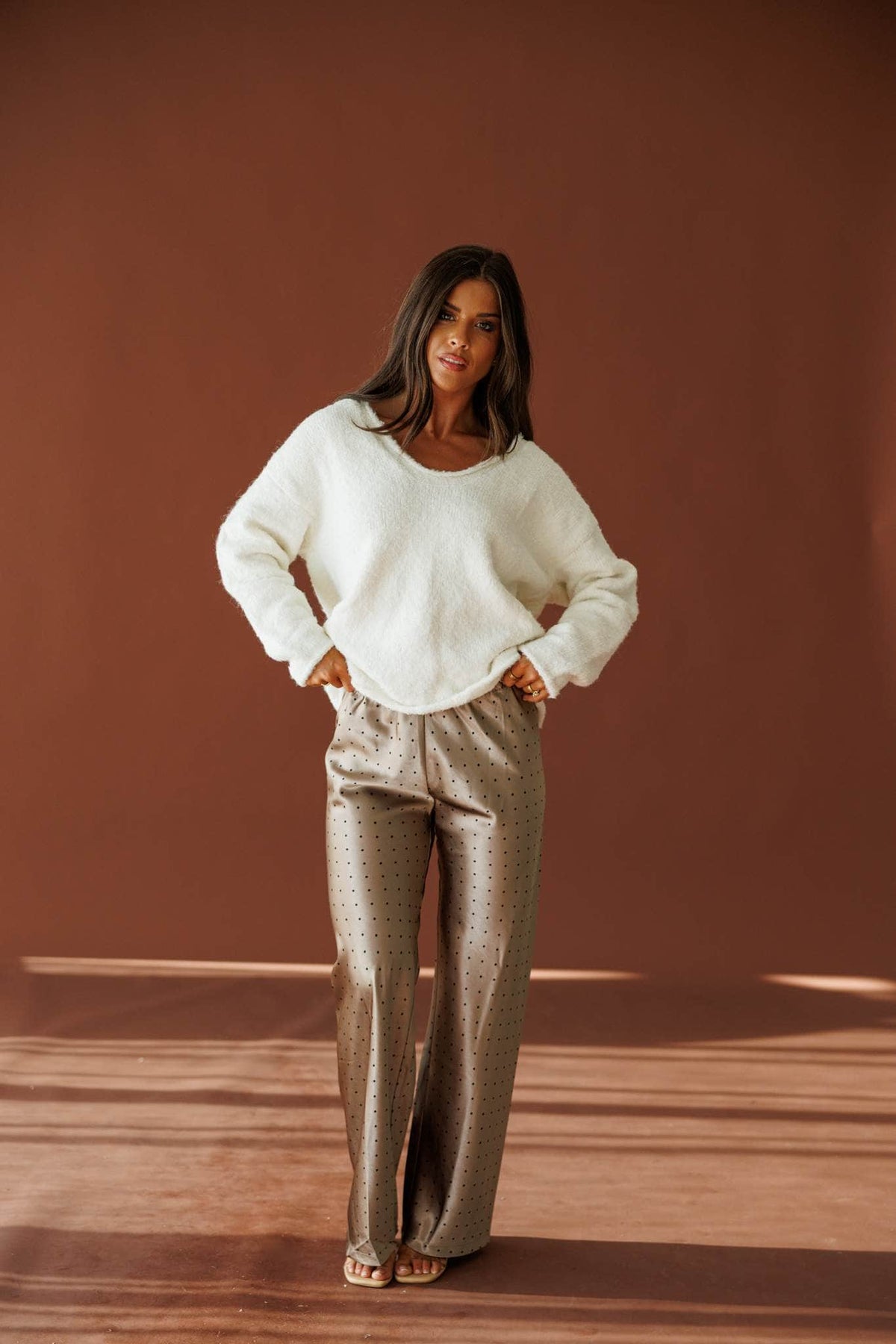 Half Past Cozy Sweater in ivory, full-length view with metallic wide leg pants