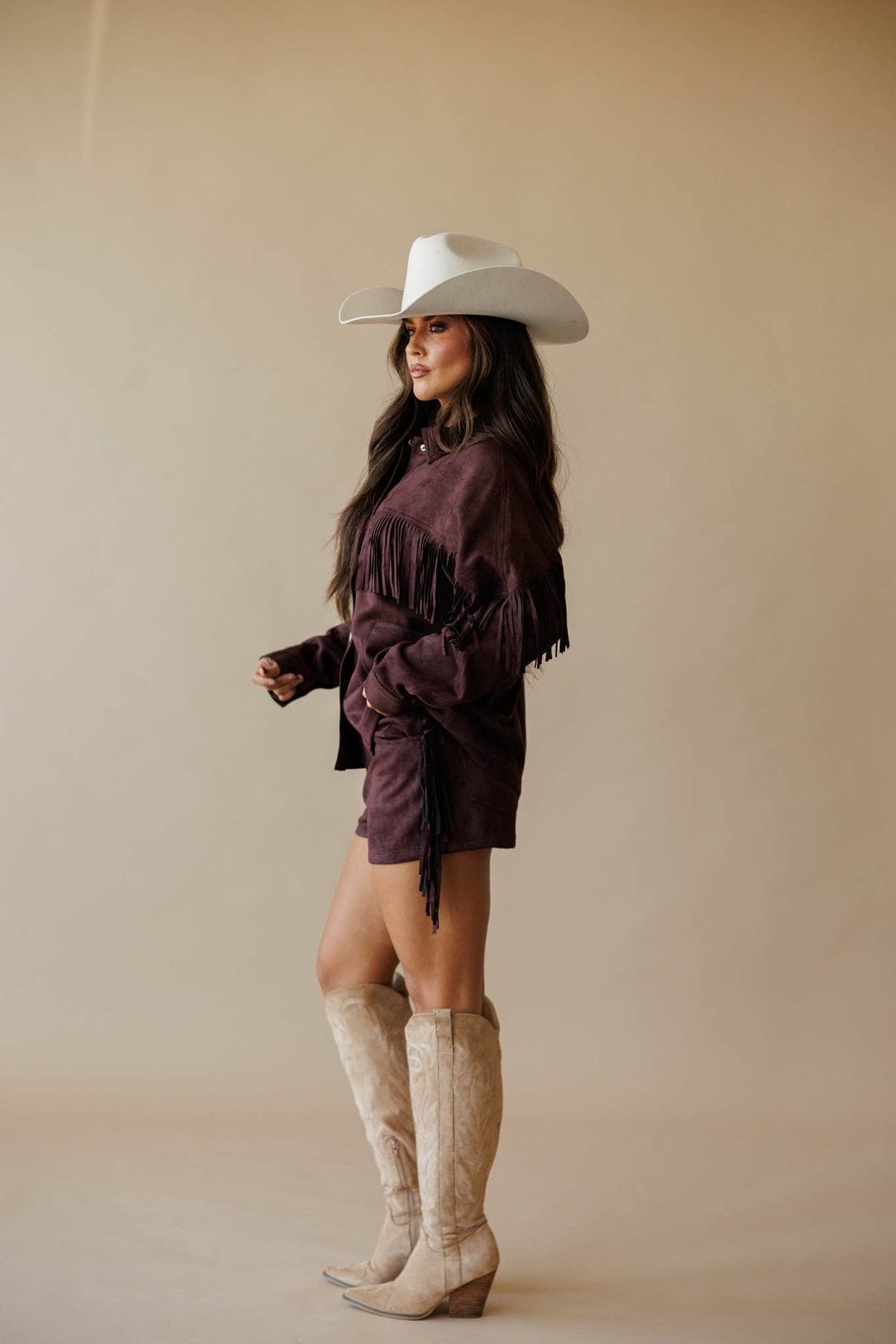 Dark brown suede shorts with fringe