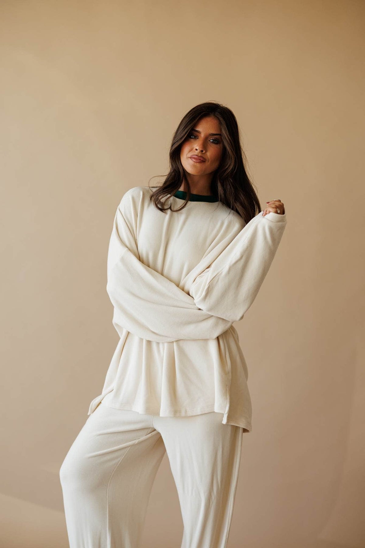 Cream oversized knit top with side slit