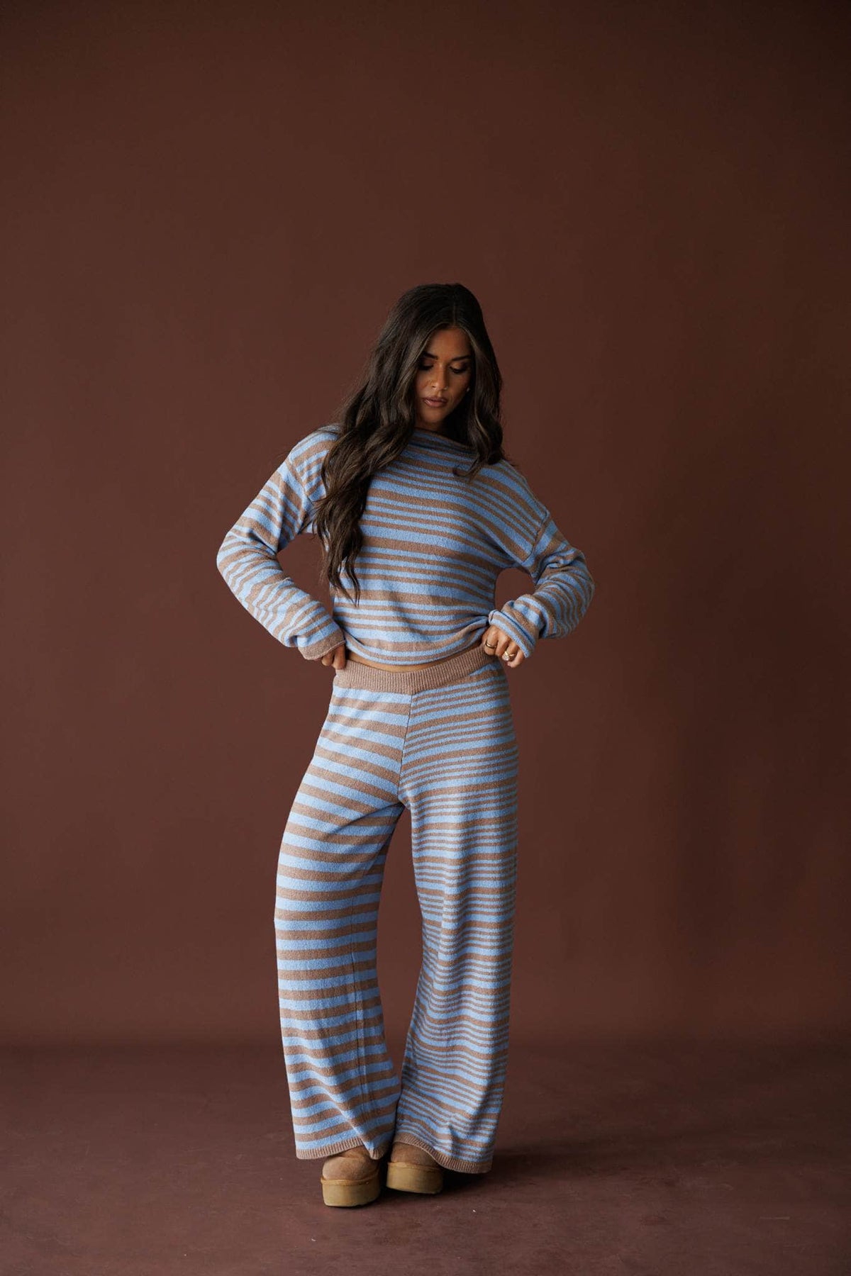 Latte Stripe Sweater in latte and blue, full-length view on a warm backdrop