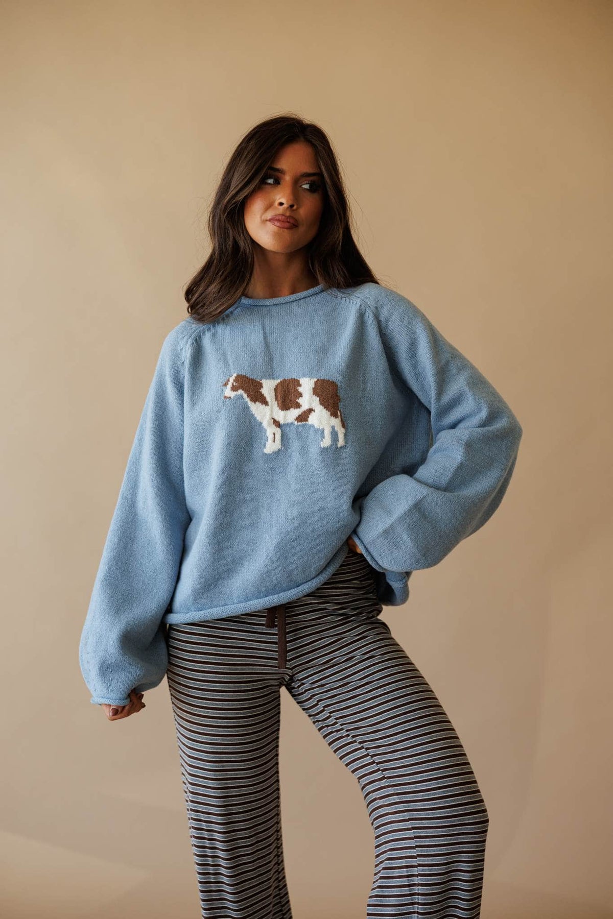 Dusty blue sweatshirt with cow graphic
