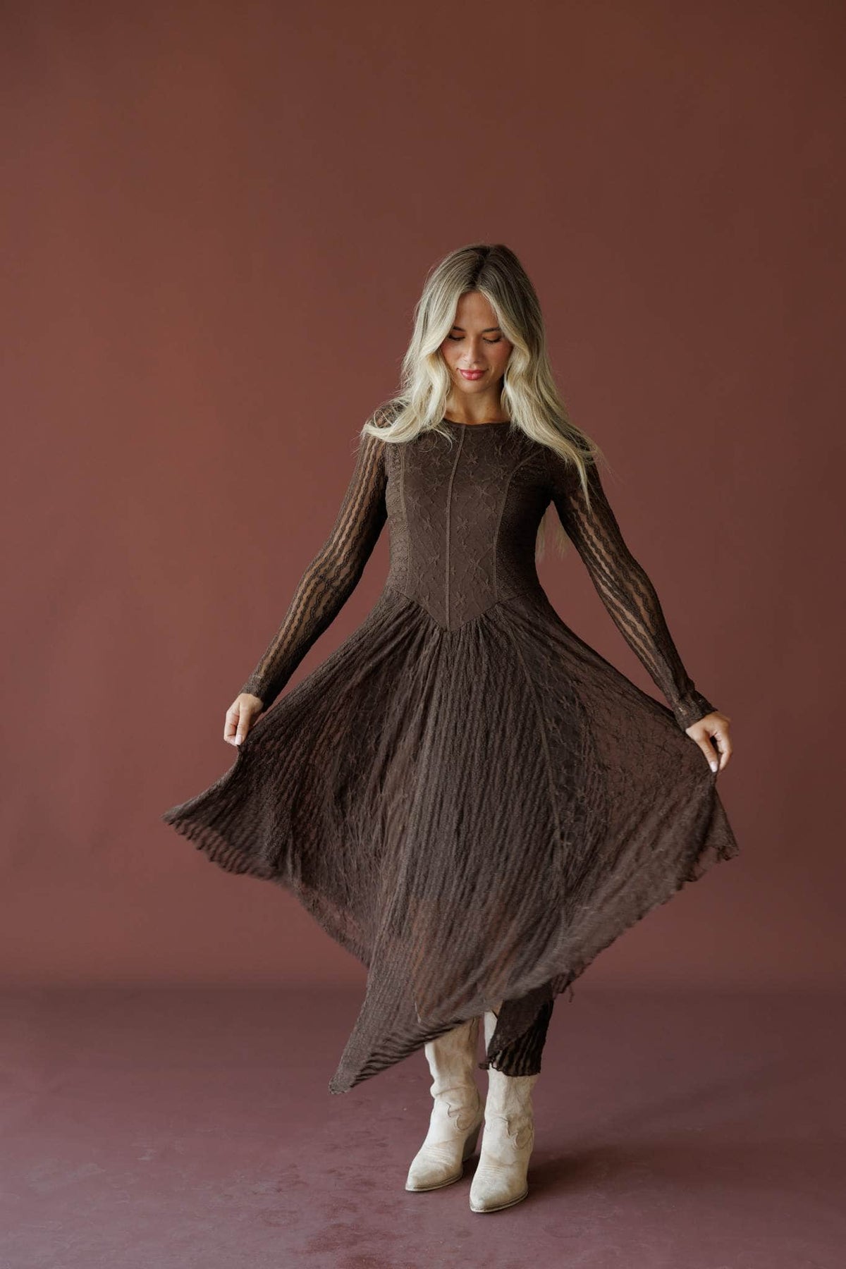 Whiskey And Lace Dress in chocolate, front view on model turning with the skirt flaring