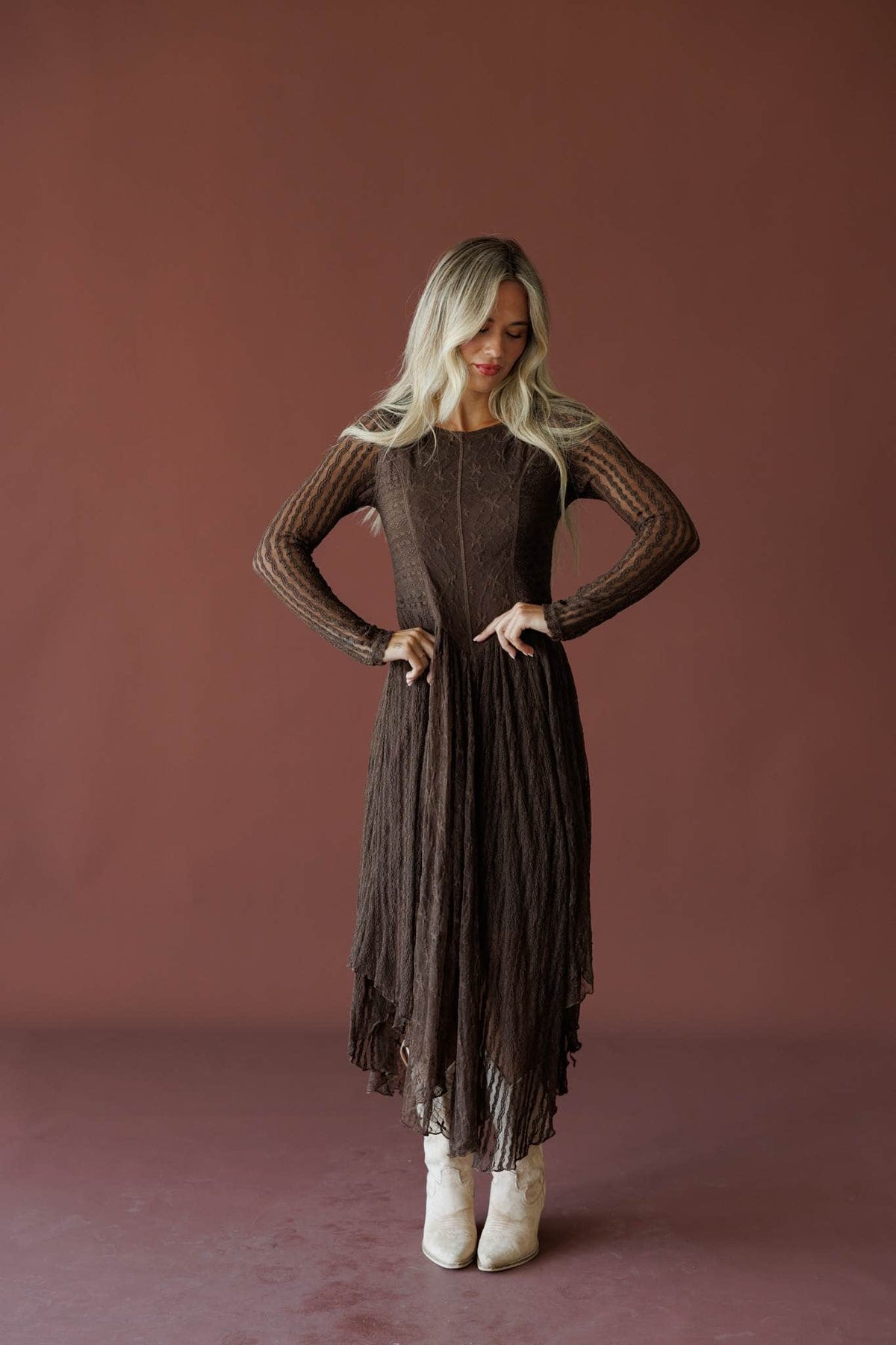 Whiskey And Lace Dress in chocolate, front view on model with hands on hips