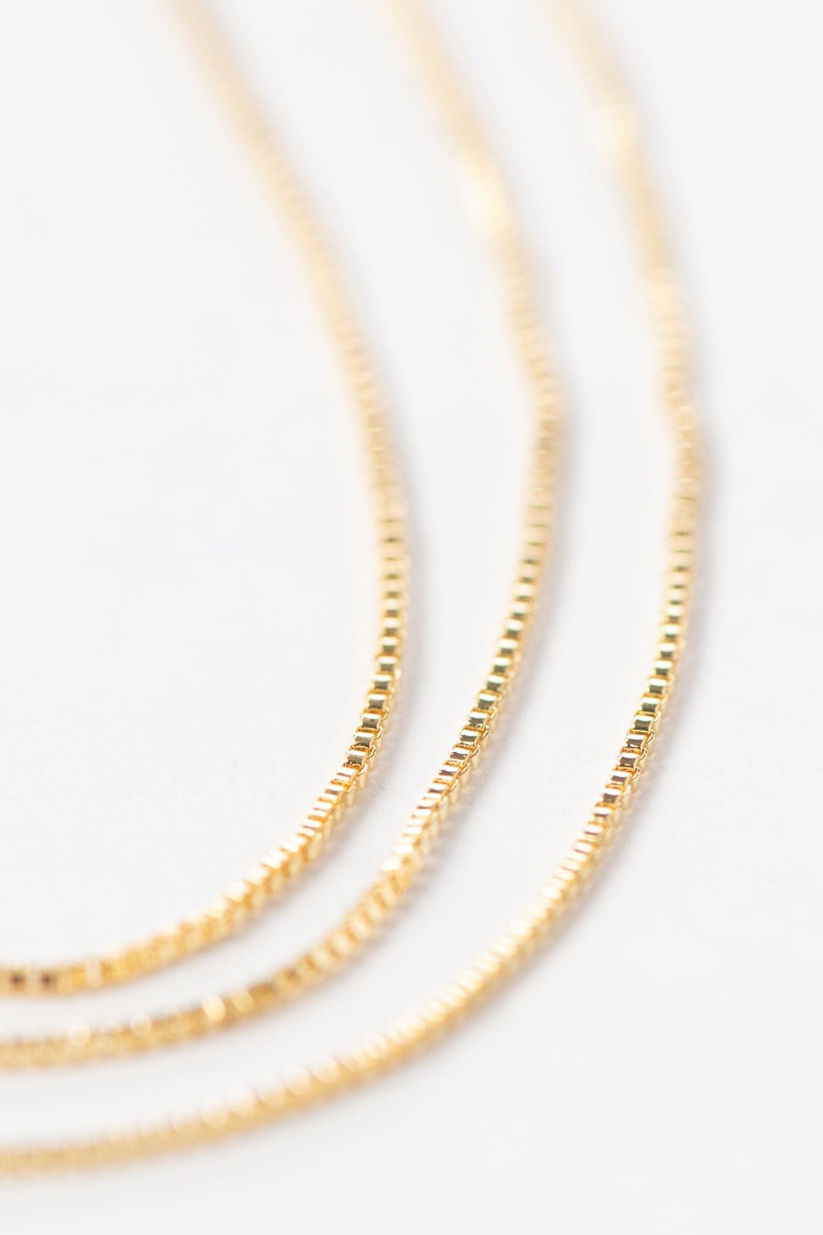 JN1021 triple strand gold necklace by together