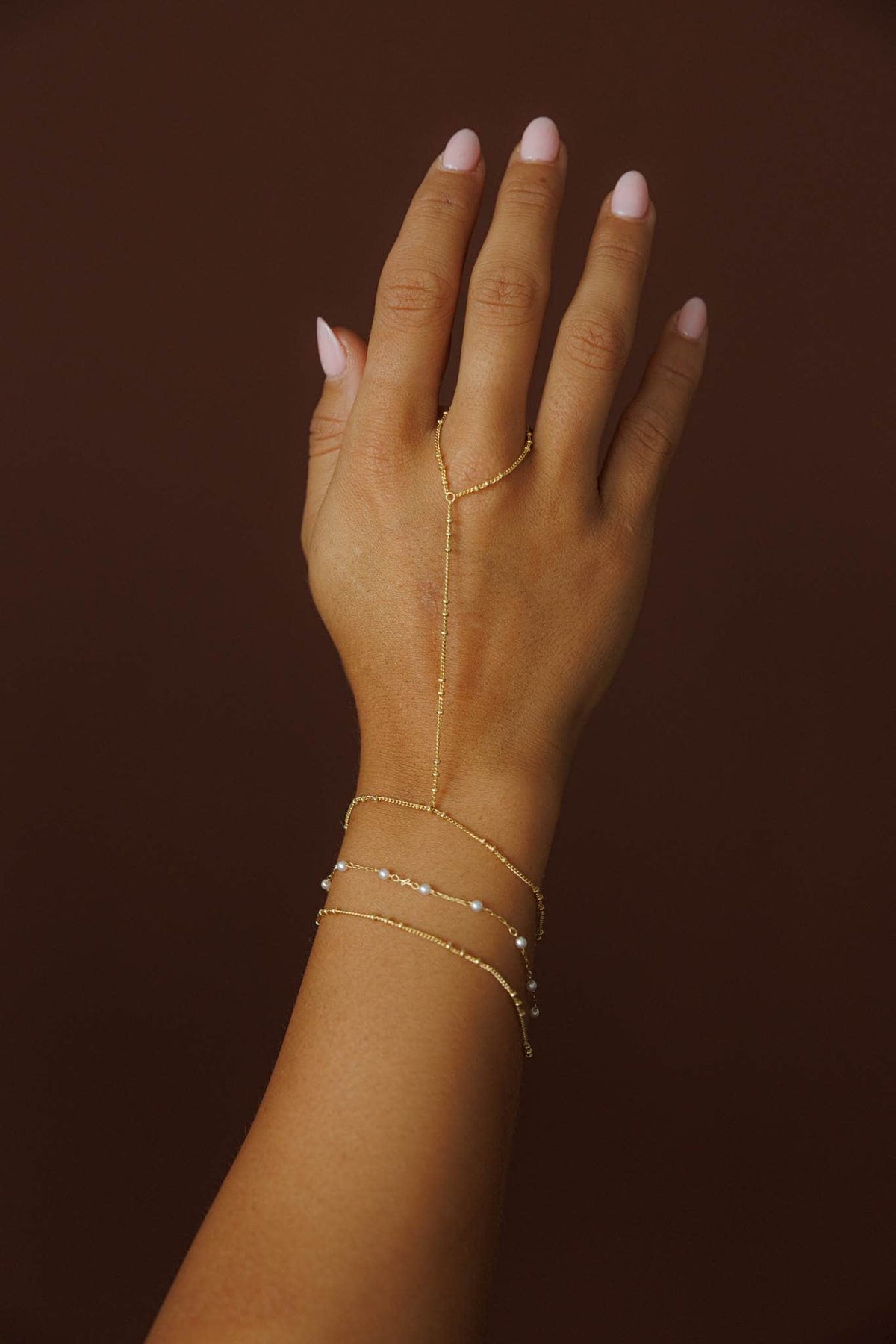 Gold Three Layer Hand Chain, worn across the back of the hand