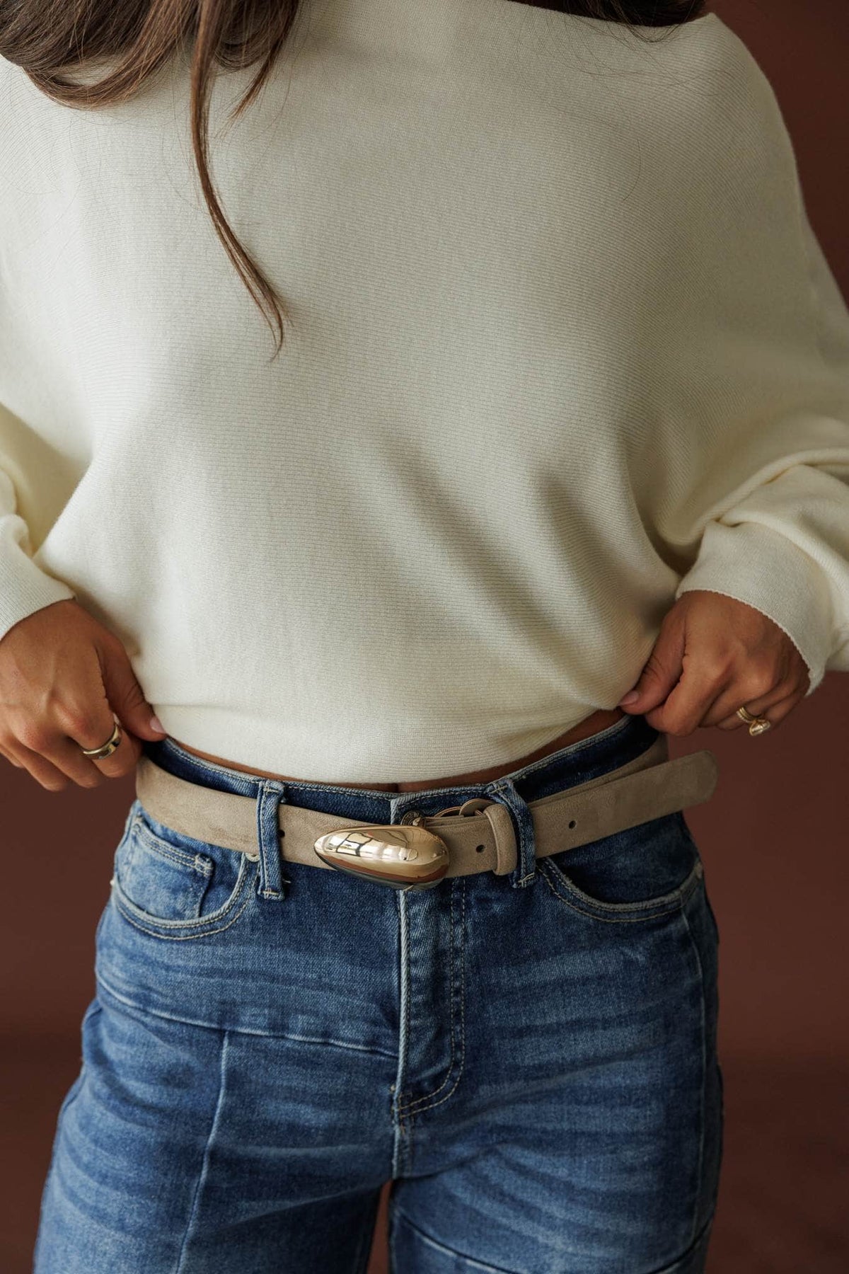 Boston Belt, in dune suede, close side view of the suede belt at the waist