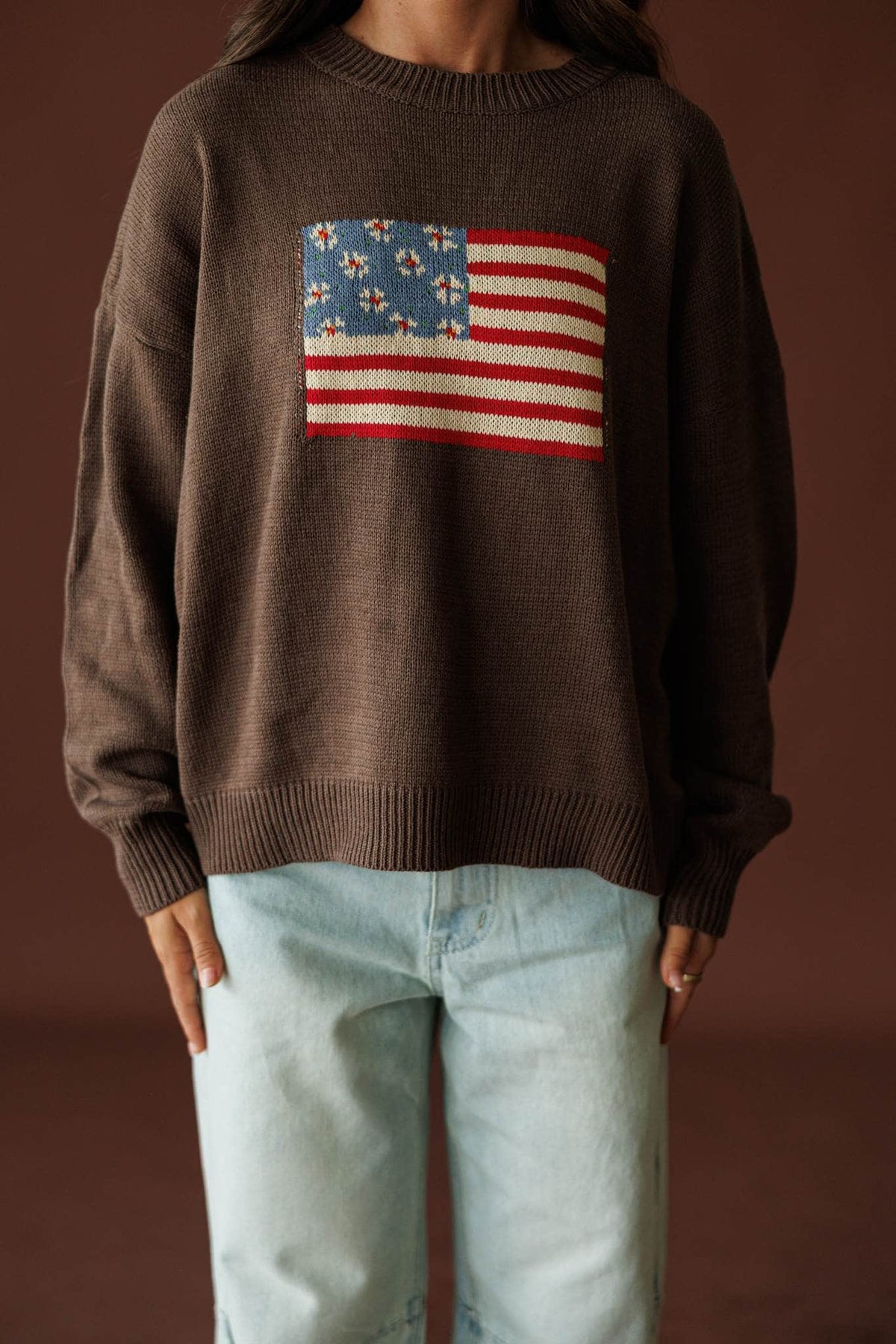 Homegrown Flag Sweater in cocoa, front close-up of the knitted American flag on the chest