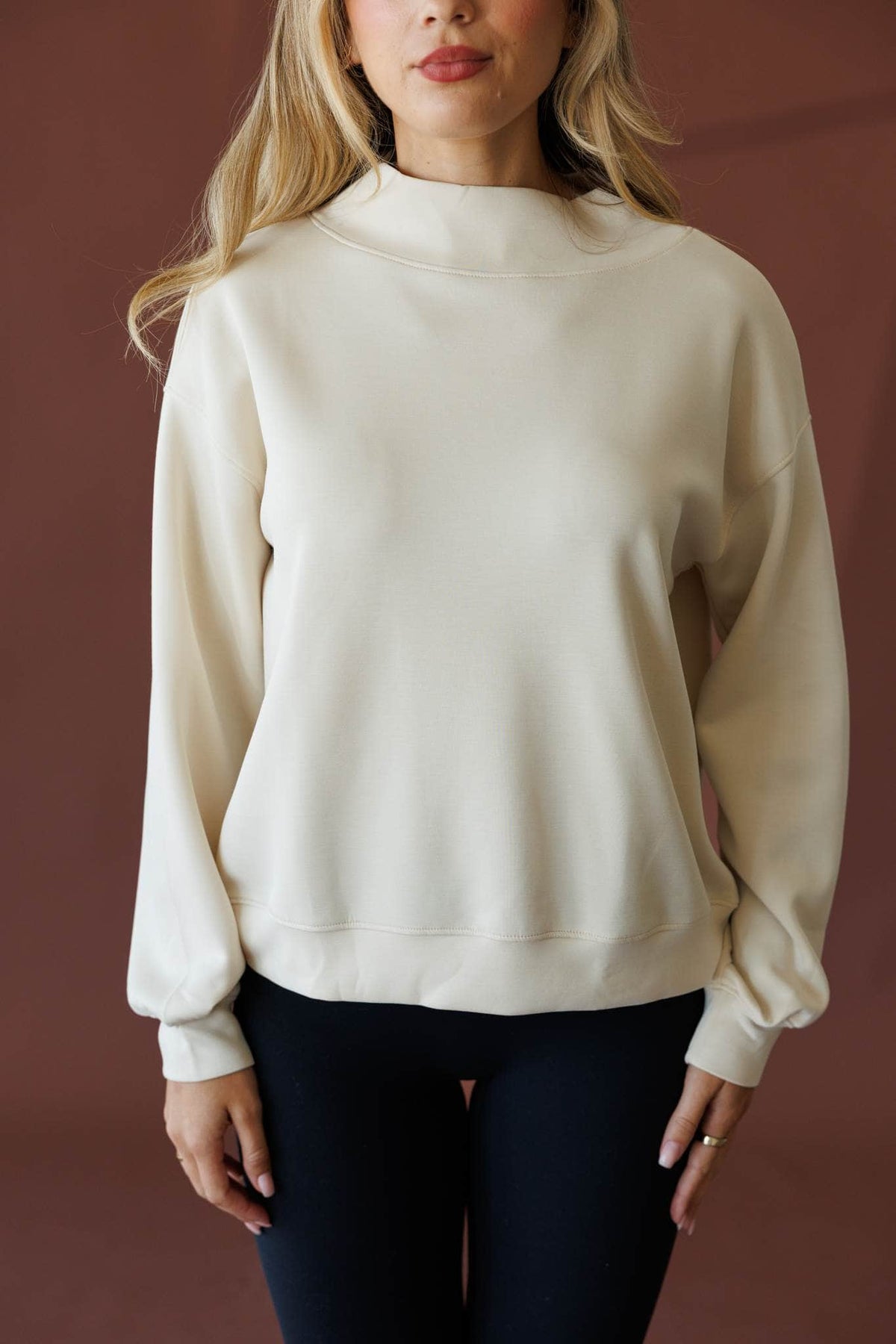 Cream mock neck sweatshirt