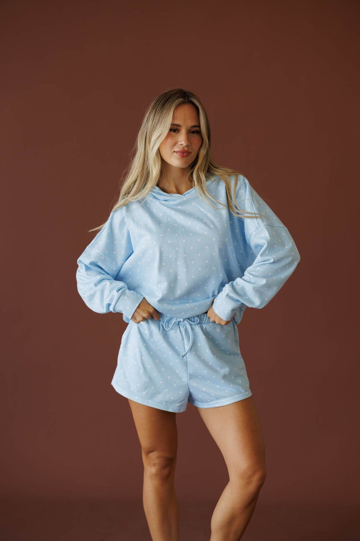 Baby Blue Polkadot Shorts in baby blue, full-length view with the matching hoodie