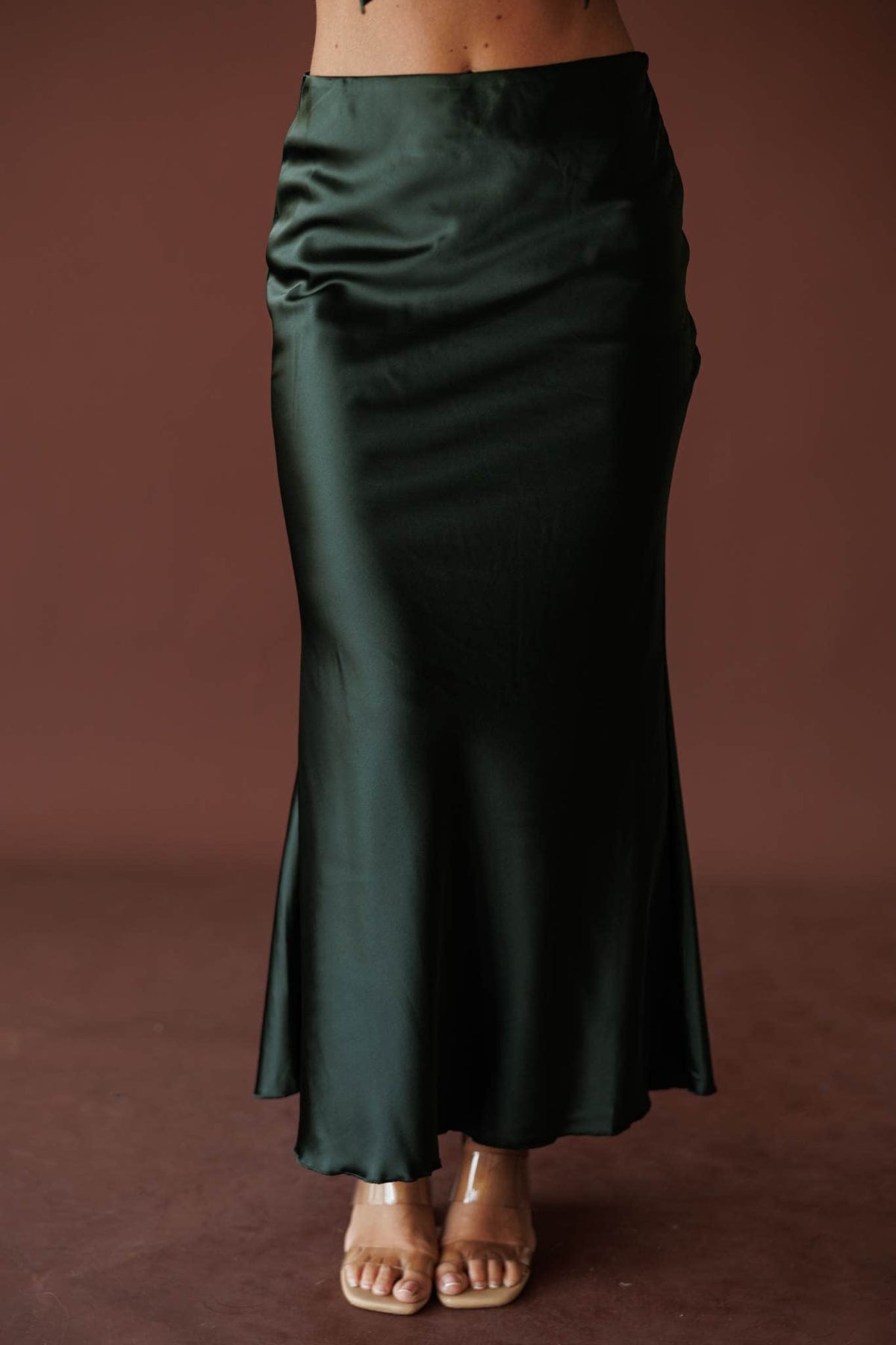 Dark green satin bias midi skirt, front view