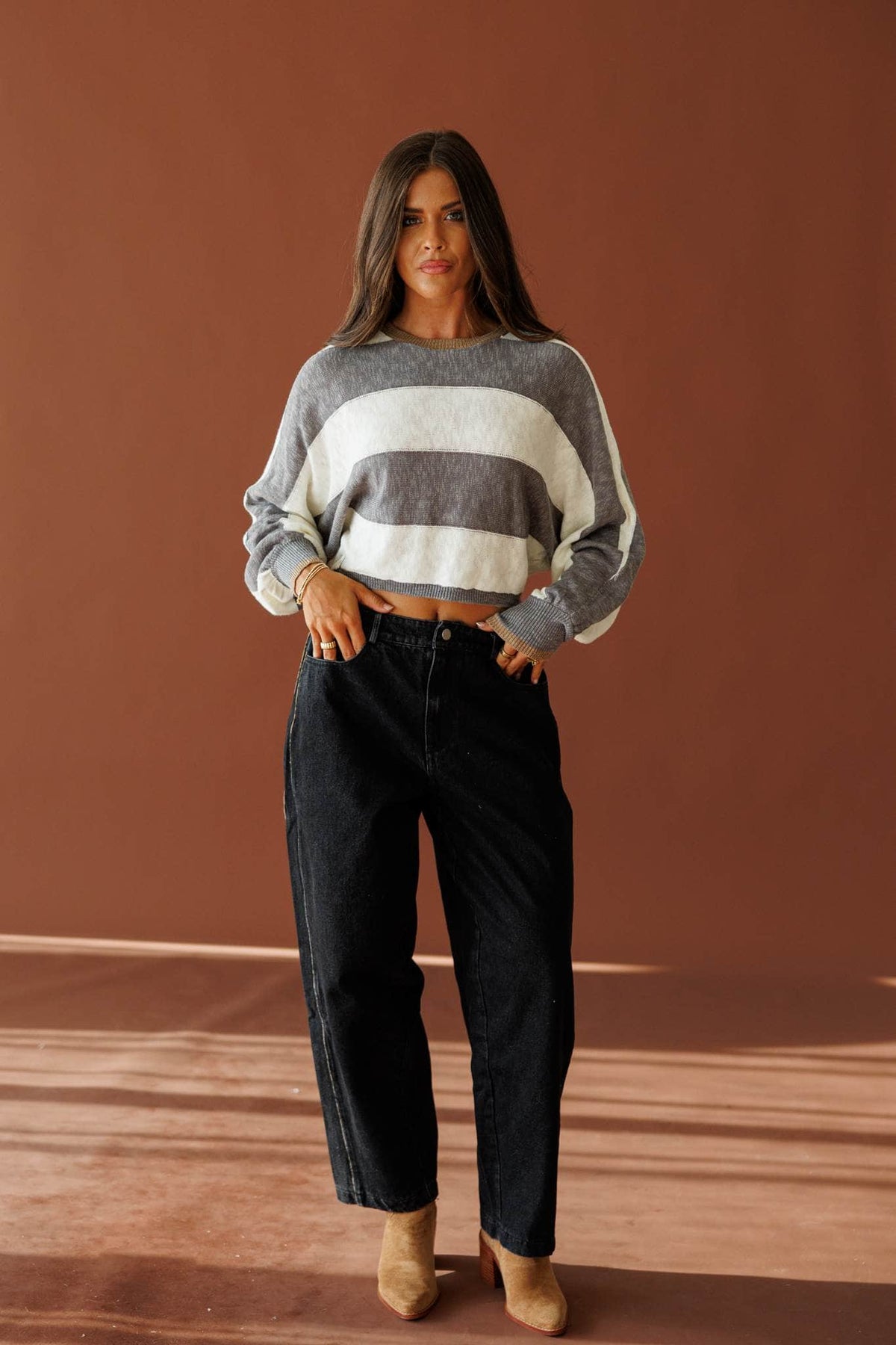 Black Leopard Piping Detail Barrel Jean in black, full-length view with a colour block sweater