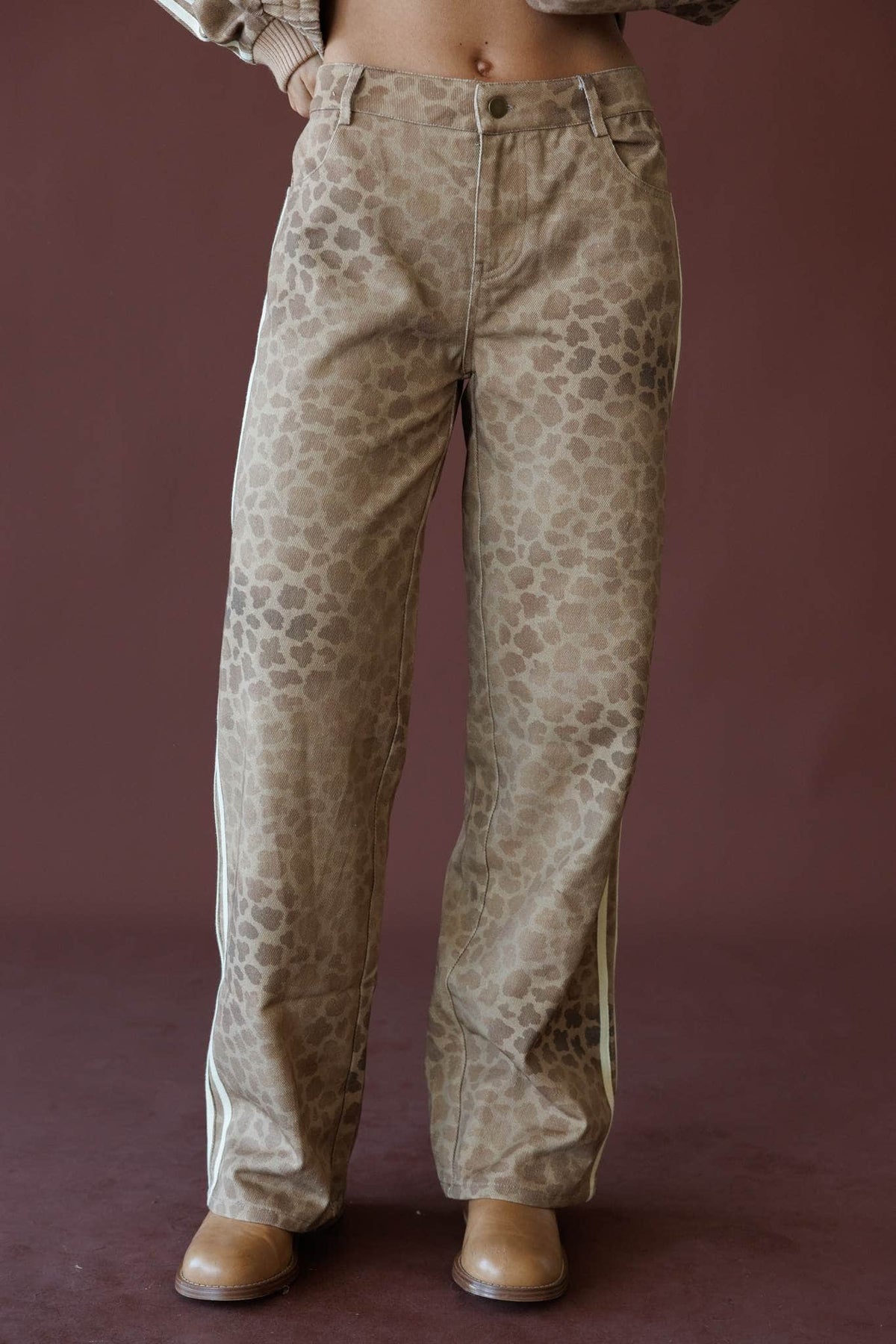 Tan leopard print pants, front view