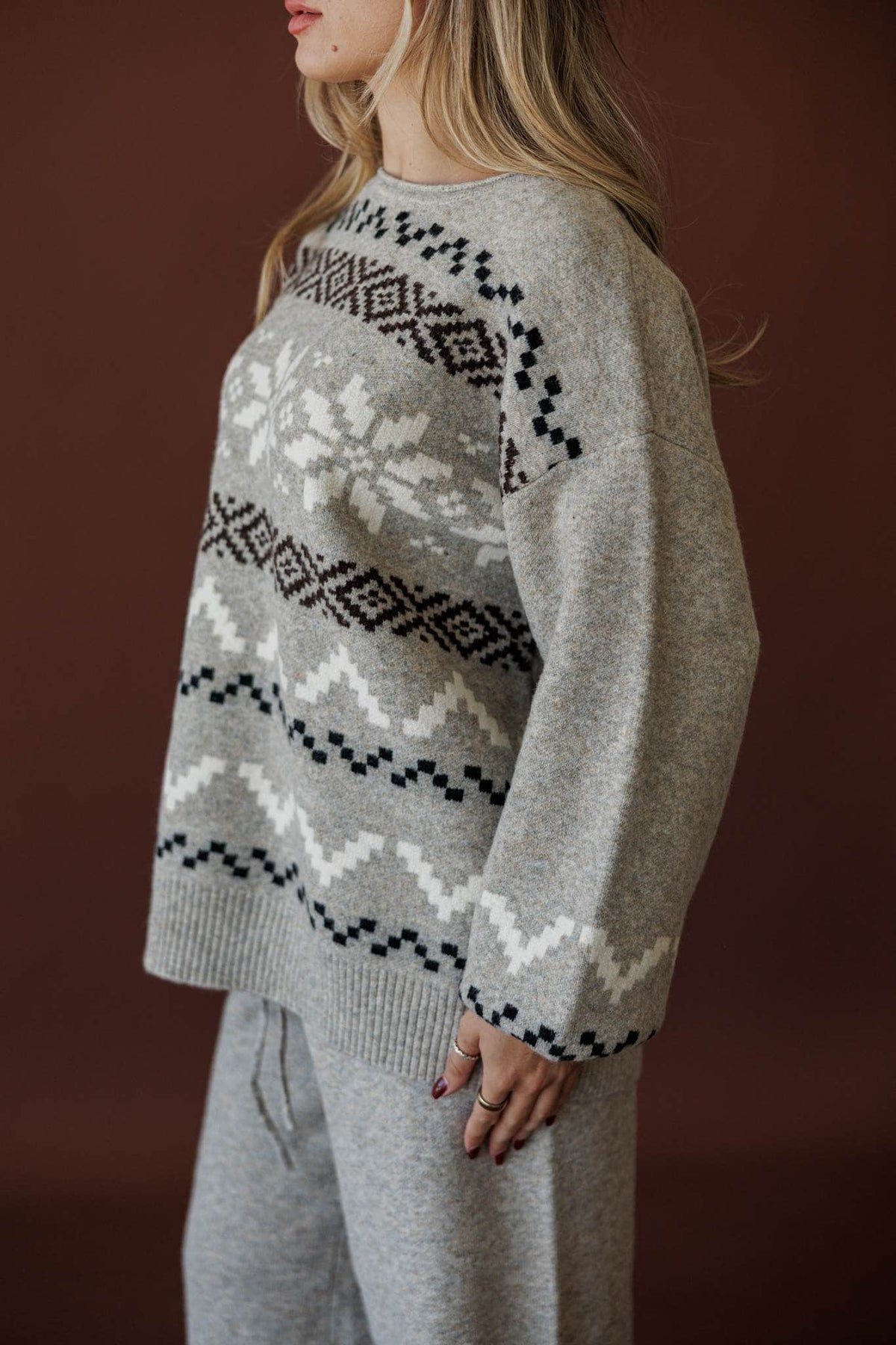 Cabin Cozy Sweater, in stone, three-quarter view of the drop shoulder