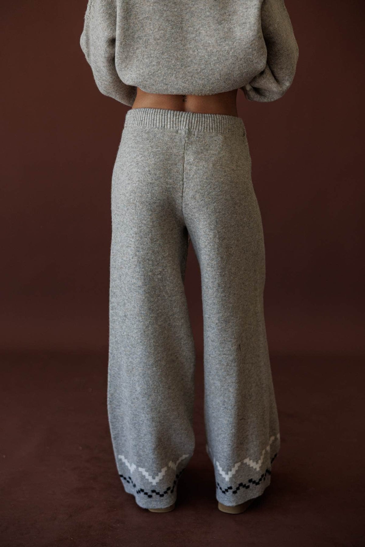Cabin Cozy Sweater Pants, in stone, front view of the alpine hem detail