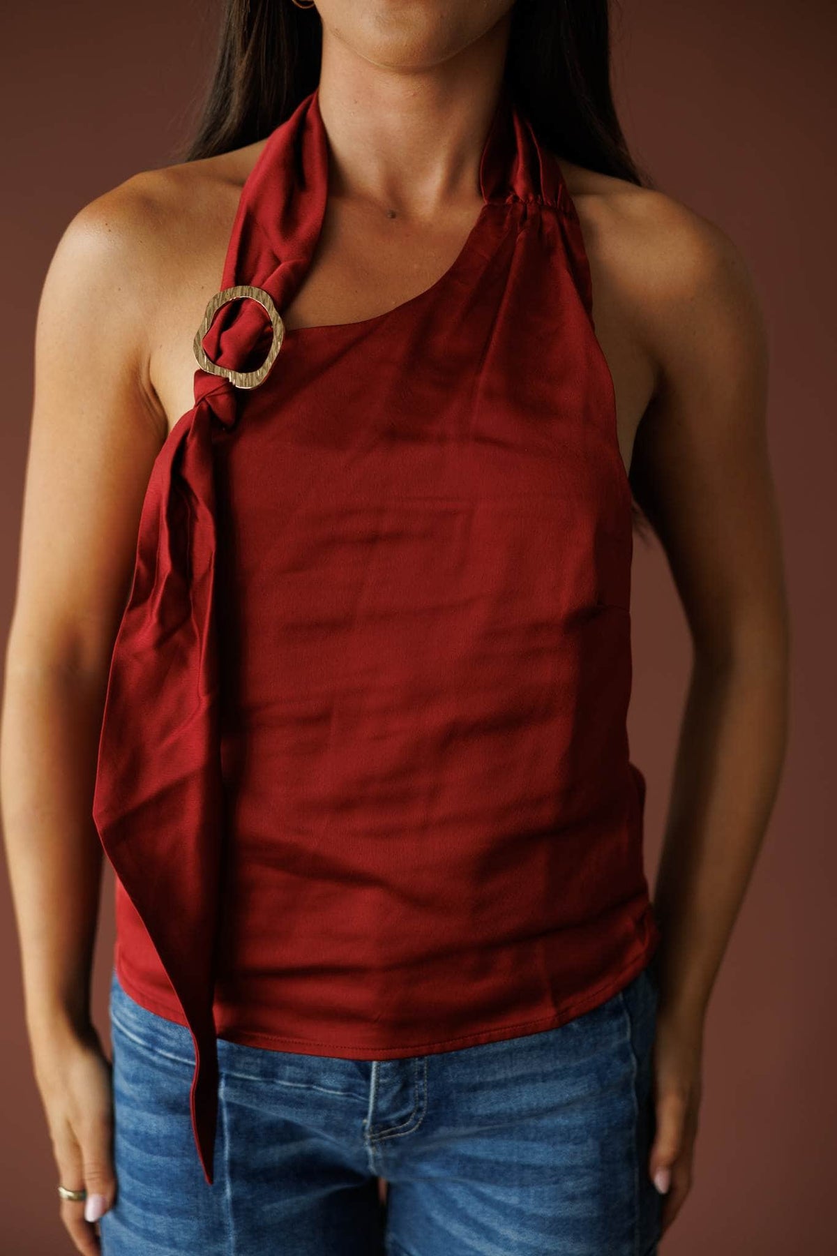 Ivory satin halter top with a draped neckline