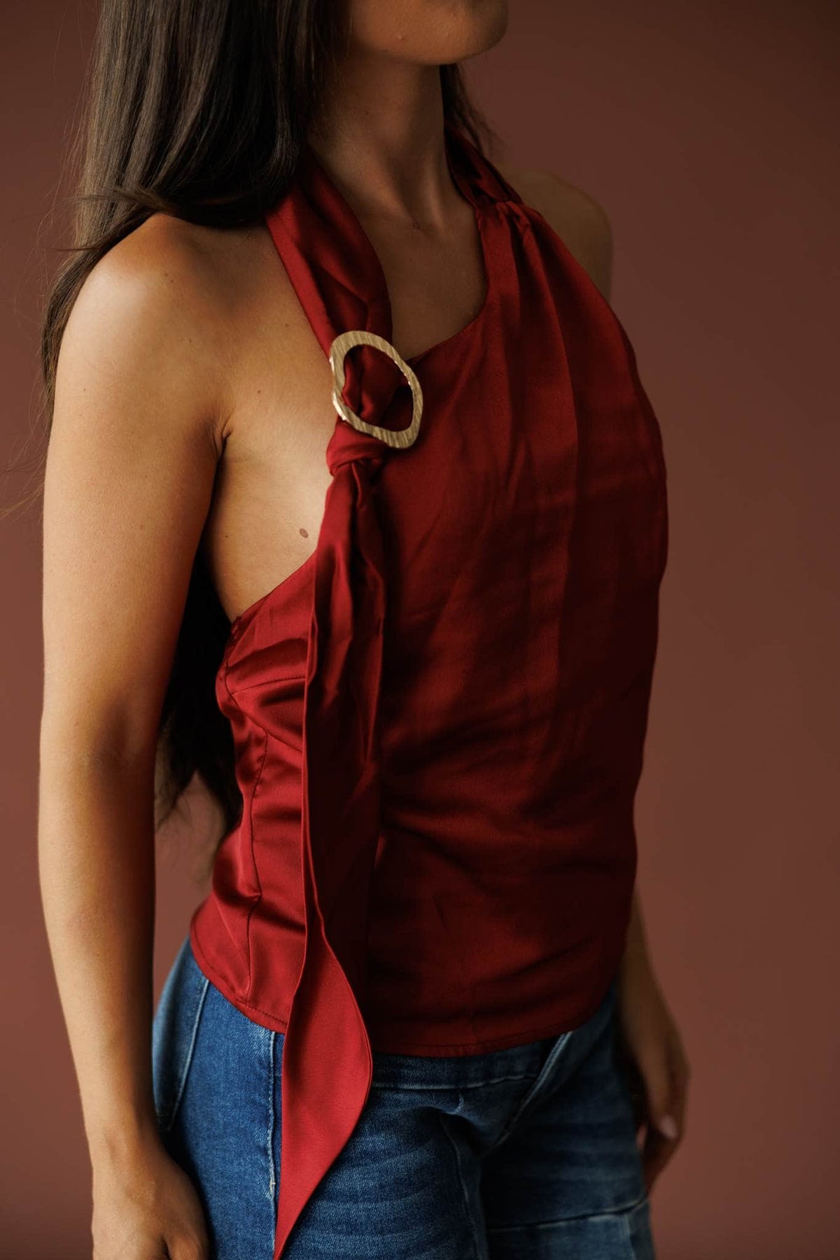 Ivory satin halter top with a draped neckline