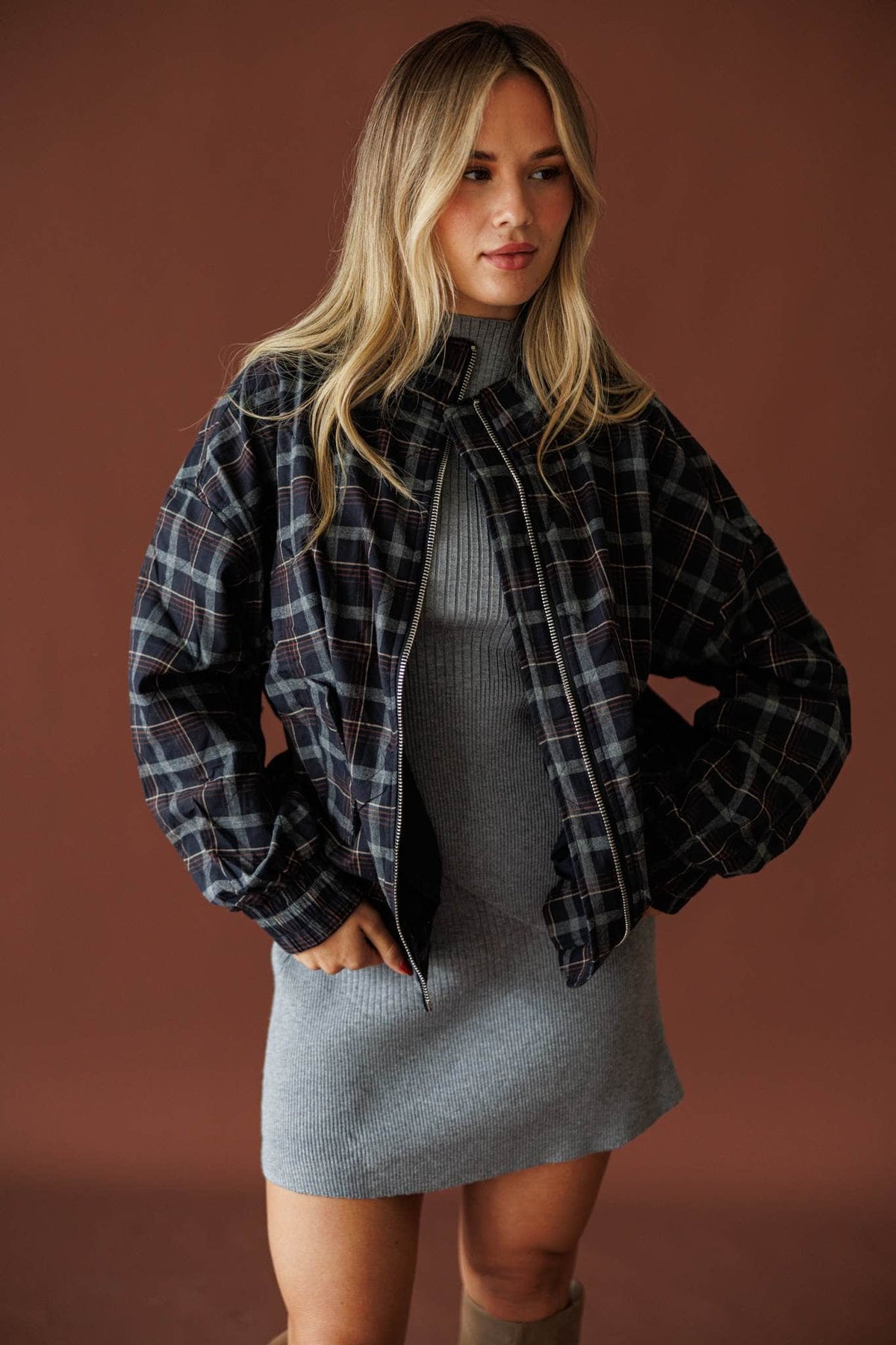 Homecoming Plaid Bomber Jacket in navy multi, three-quarter view with hands in the pockets