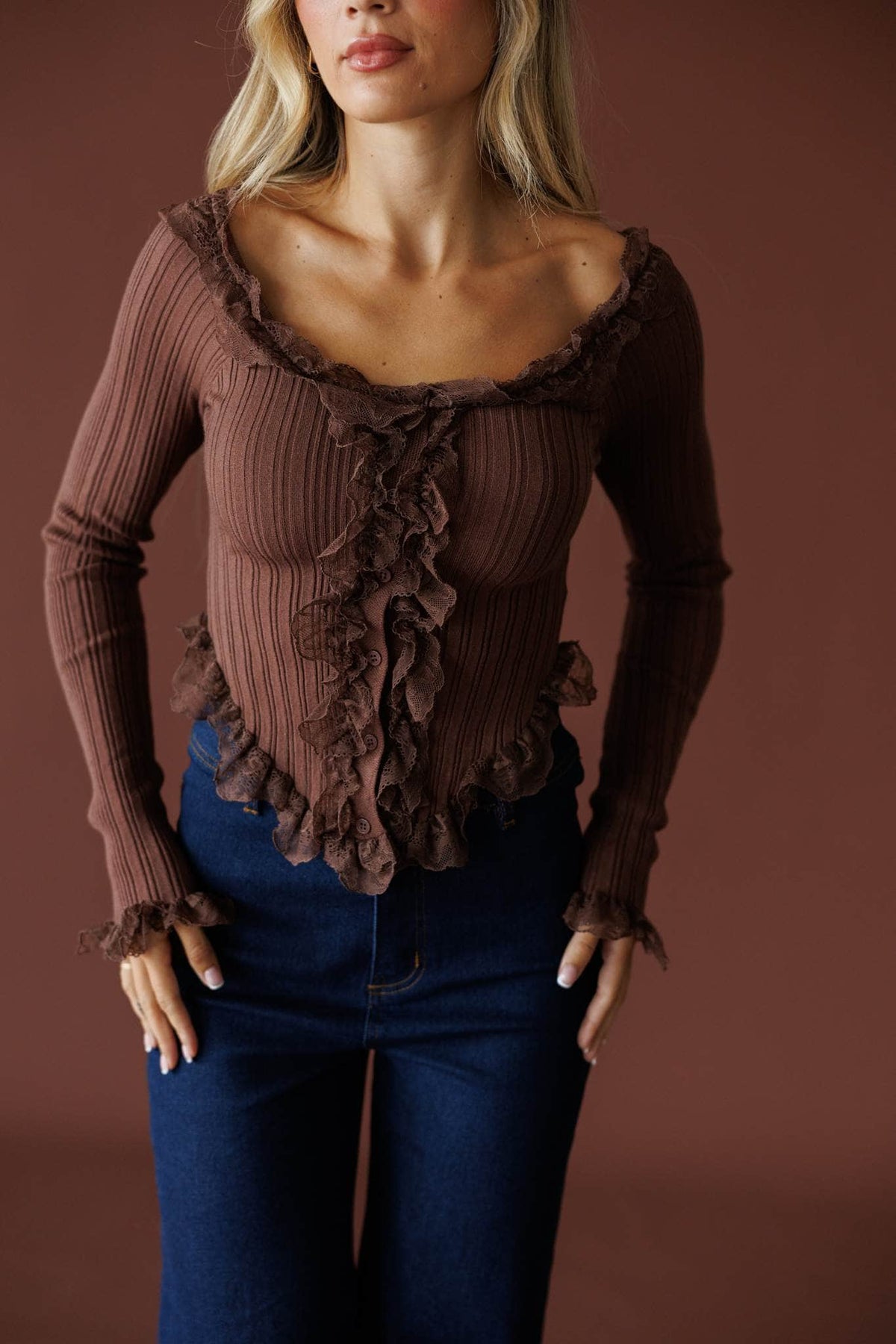 Colette Ruffle Top in mocha, front close-up of the ruffle placket and scoop neck