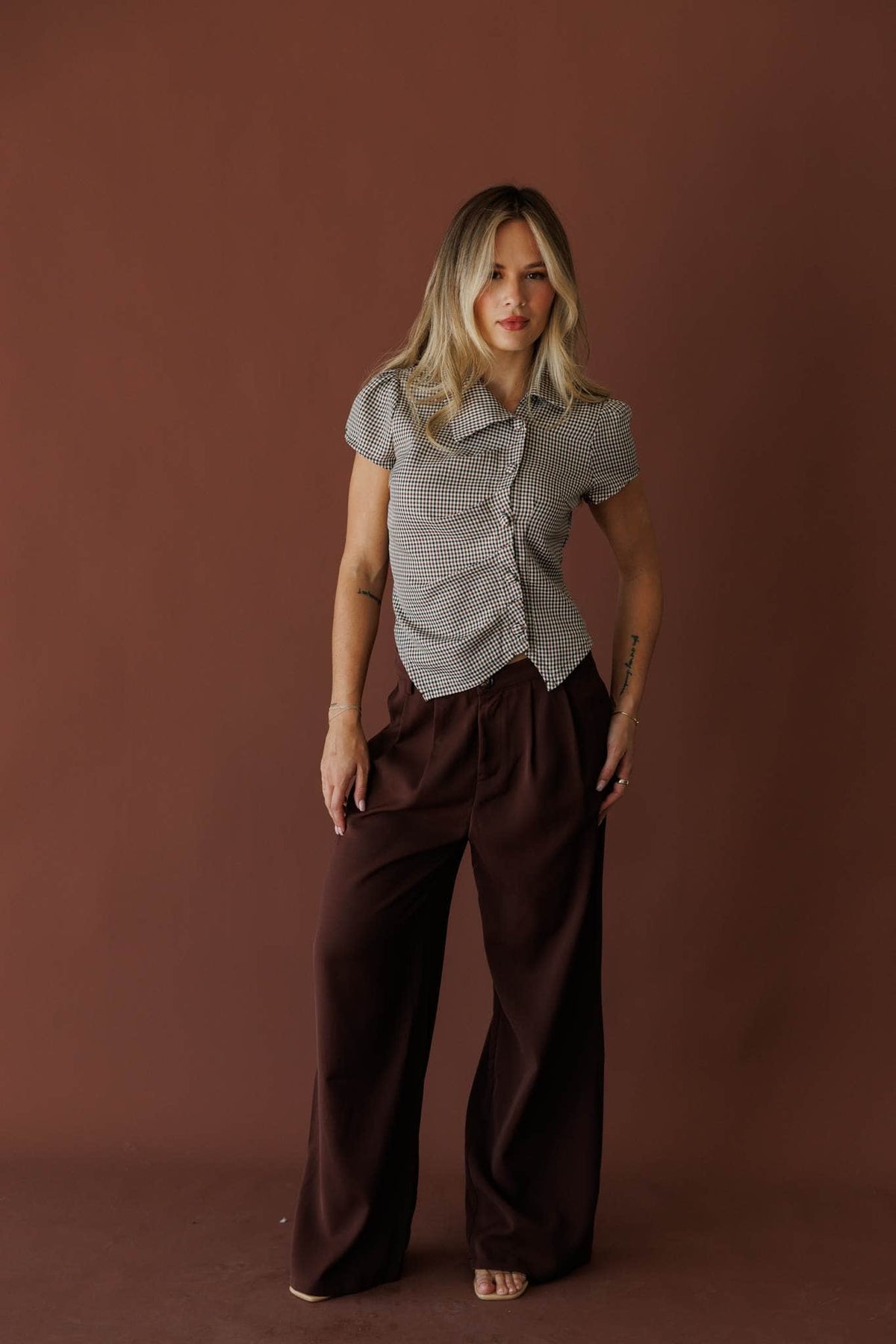 Dark brown pleated wide leg trousers
