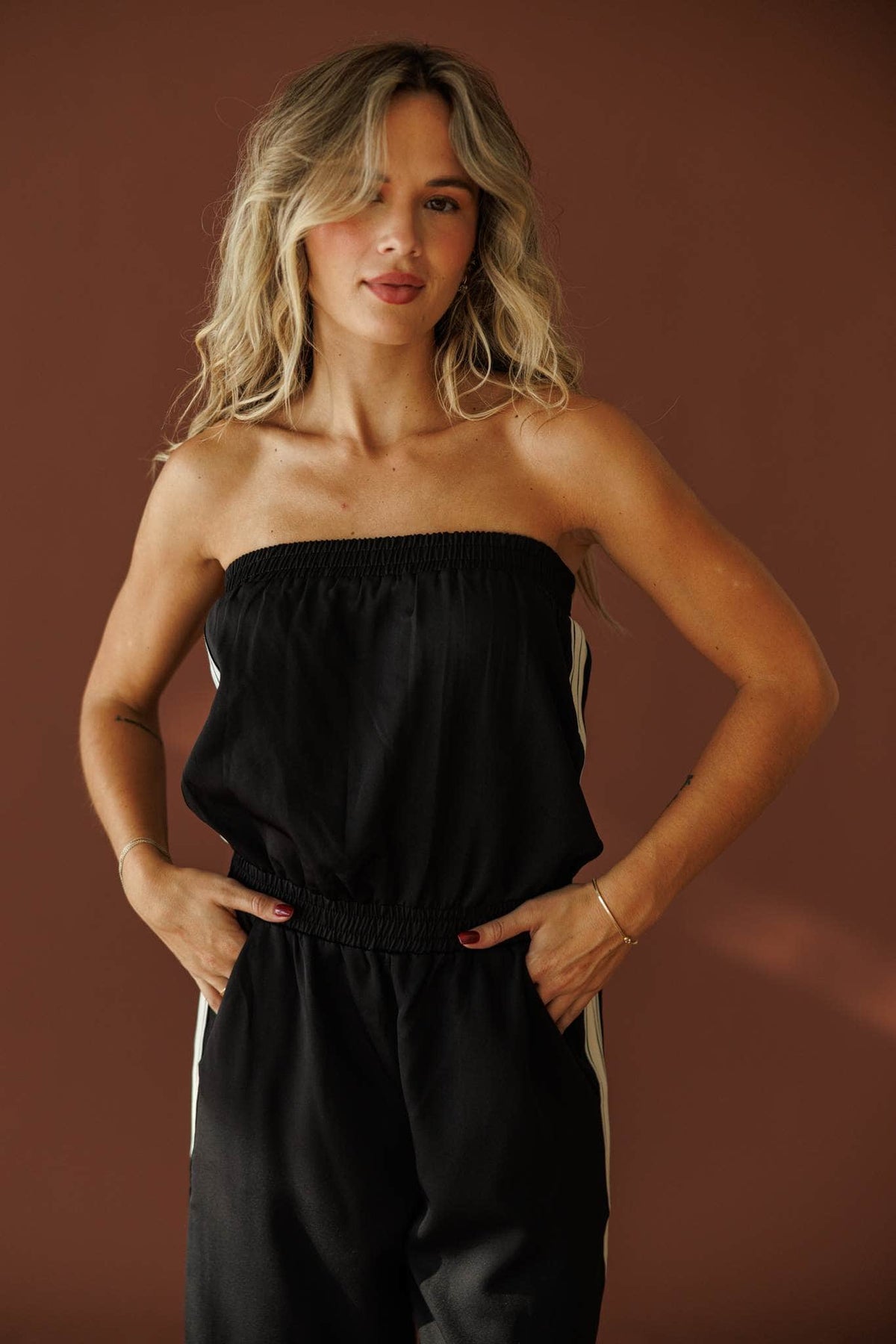Curtain Call Jumpsuit in black, front close-up of the strapless bodice