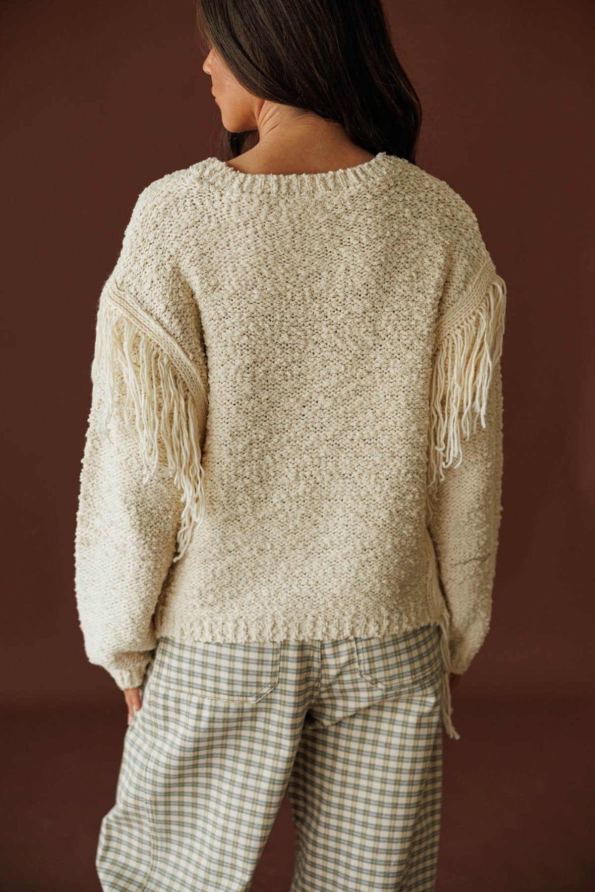 Cream Fringe Pullover Sweater, back view of the oversized silhouette